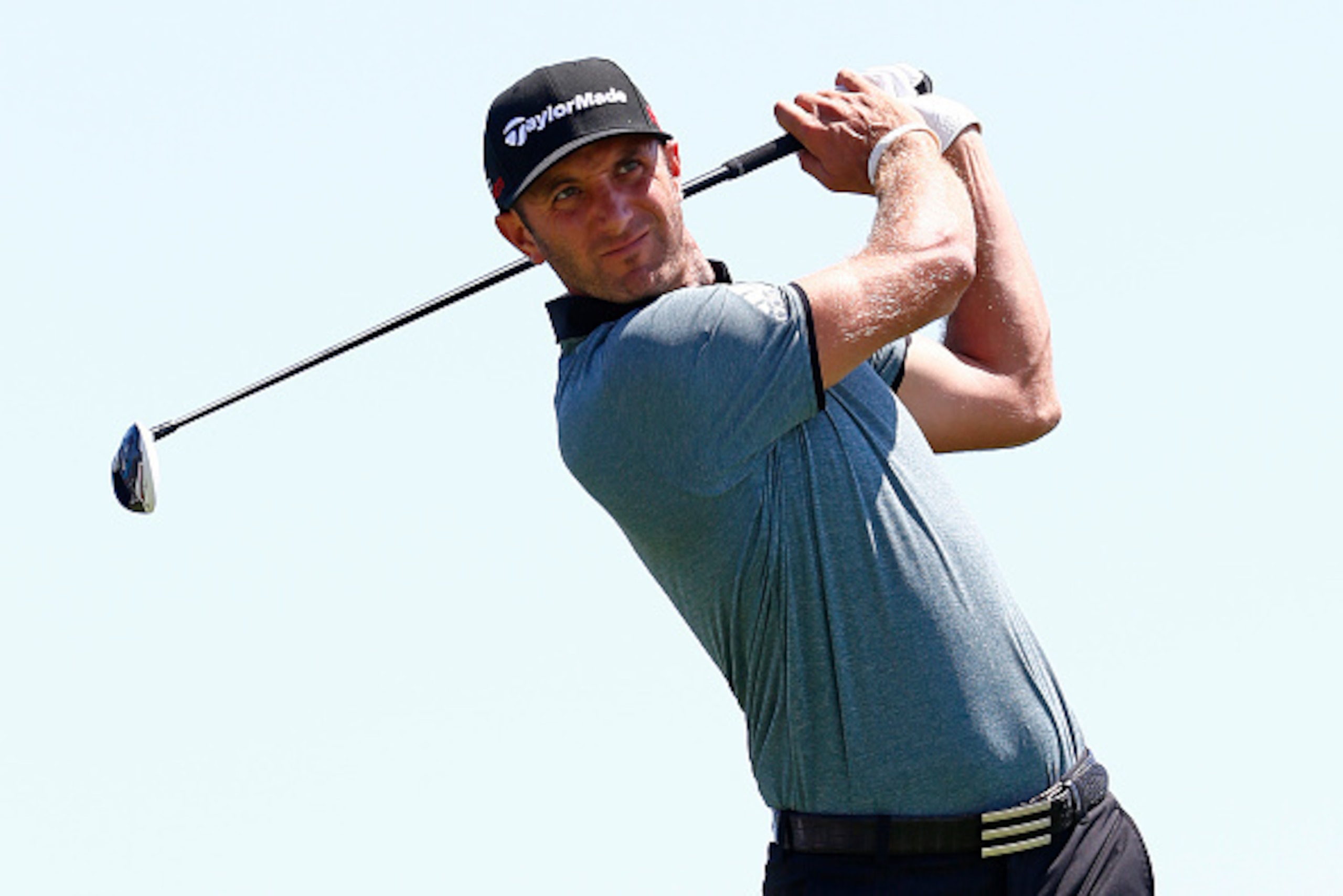 SHEBOYGAN, WI - AUGUST 11:  Dustin Johnson of the United States watches a tee shot during a practice round prior to the 2015 PGA Championship at Whistling Straits on August 11, 2015 in Sheboygan, Wisconsin.  (Photo by Jamie Squire/Getty Images)