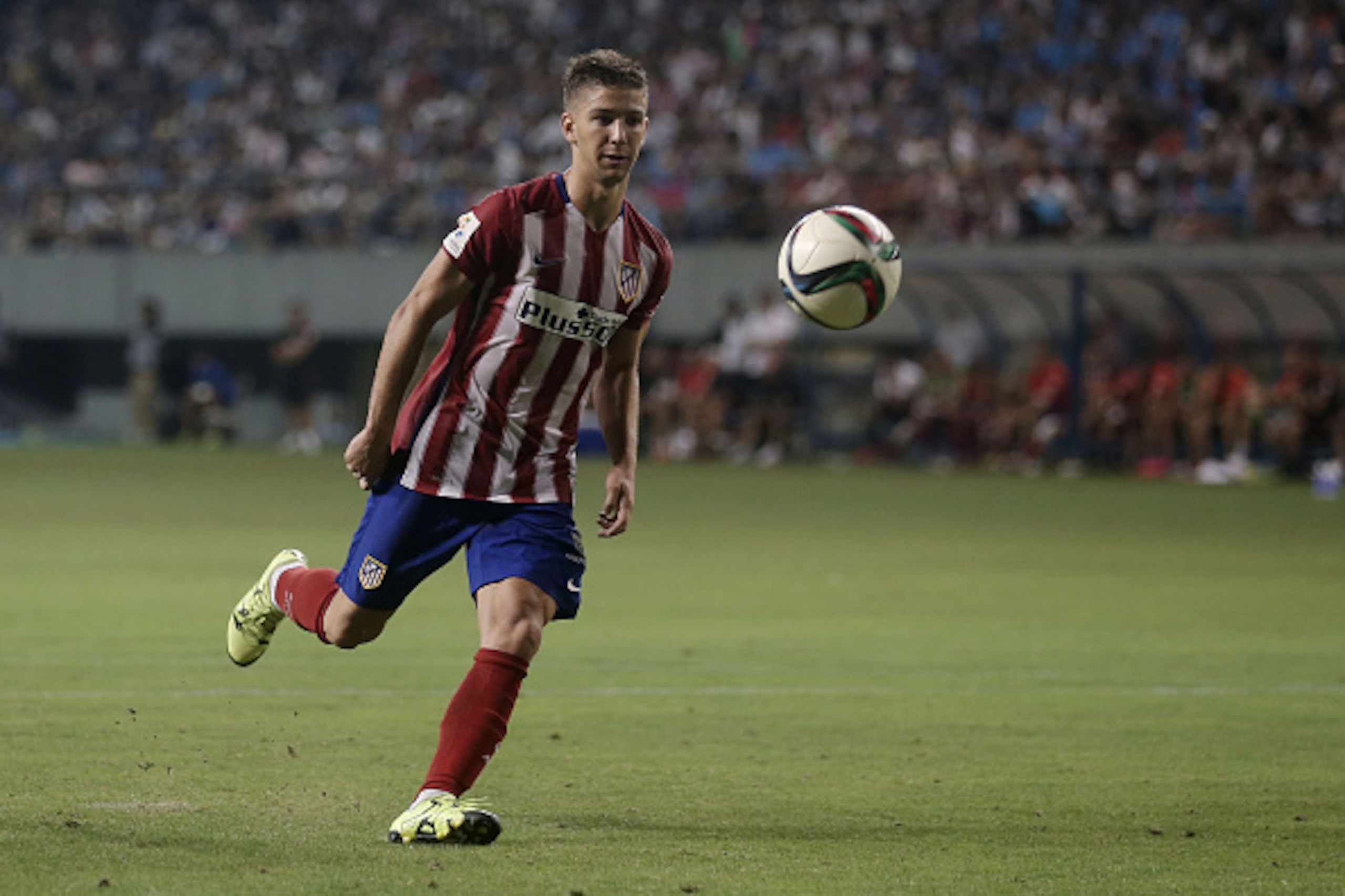 TOSU, JAPAN - AUGUST 01:  Luciano Vietto #23 of Atletico Madrid kicks the winning goal during a penalty shoot out against Sagan Tosu F.C. during the friendly match between Atletico Madrid and Sagan Tosu F.C. at Tosu Stadium on August 1, 2015 in Tosu, Japa