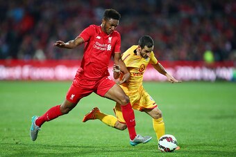 ADELAIDE, AUSTRALIA - JULY 20:  Sergio Cirio of United is challenged by Joe Gomez of Liverpool during the international friendly match between Adelaide United and Liverpool FC at Adelaide Oval on July 20, 2015 in Adelaide, Australia.  (Photo by Matt King/