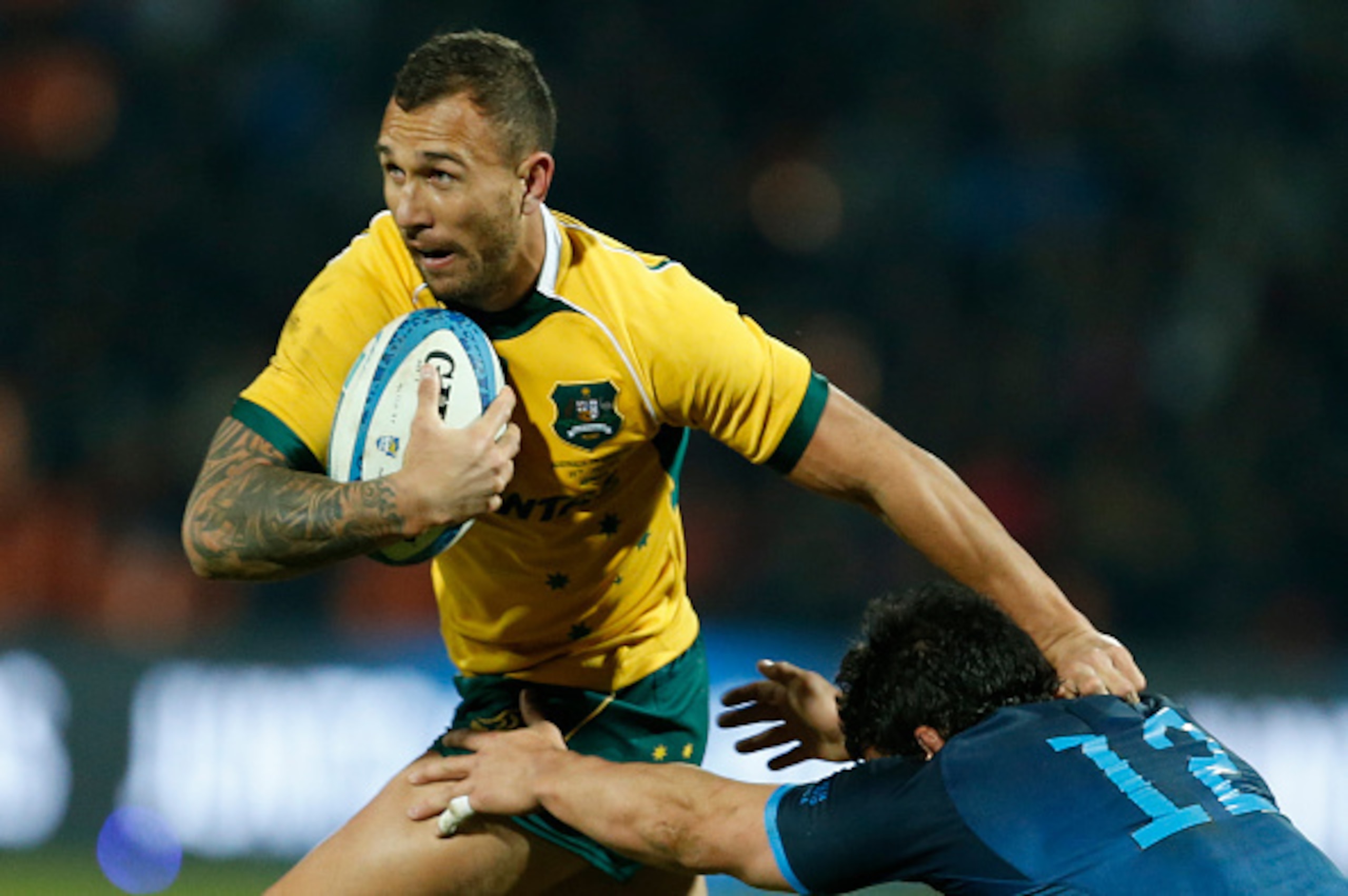 MENDOZA, ARGENTINA - JULY 25:  Quade Cooper of Australia fights for the ball with Juan Pablo Socino of Argentina during a match between Australia and Argentina as part of The Rugby Championship 2015 at Estadio Malvinas Argentinas on July 25, 2015 in Mendo