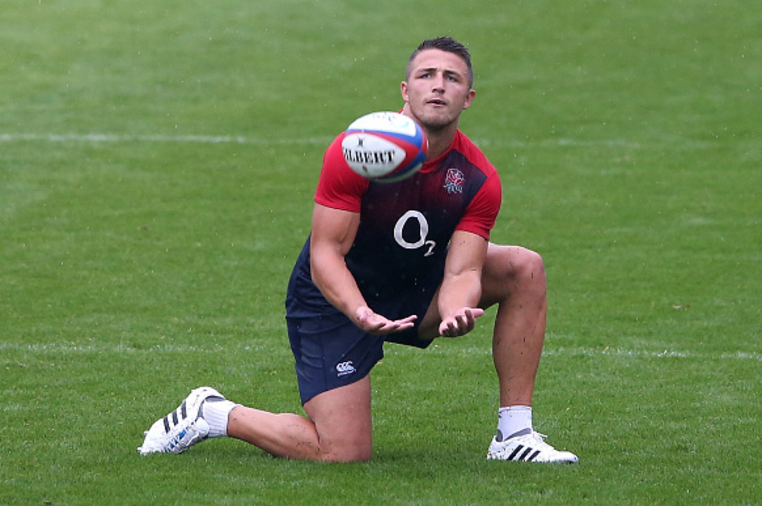 BAGSHOT, ENGLAND - AUGUST 13:  Sam Burgess catches the ball during the England training session held at Pennyhill Park on August 13, 2015 in Bagshot, England.  (Photo by David Rogers/Getty Images)