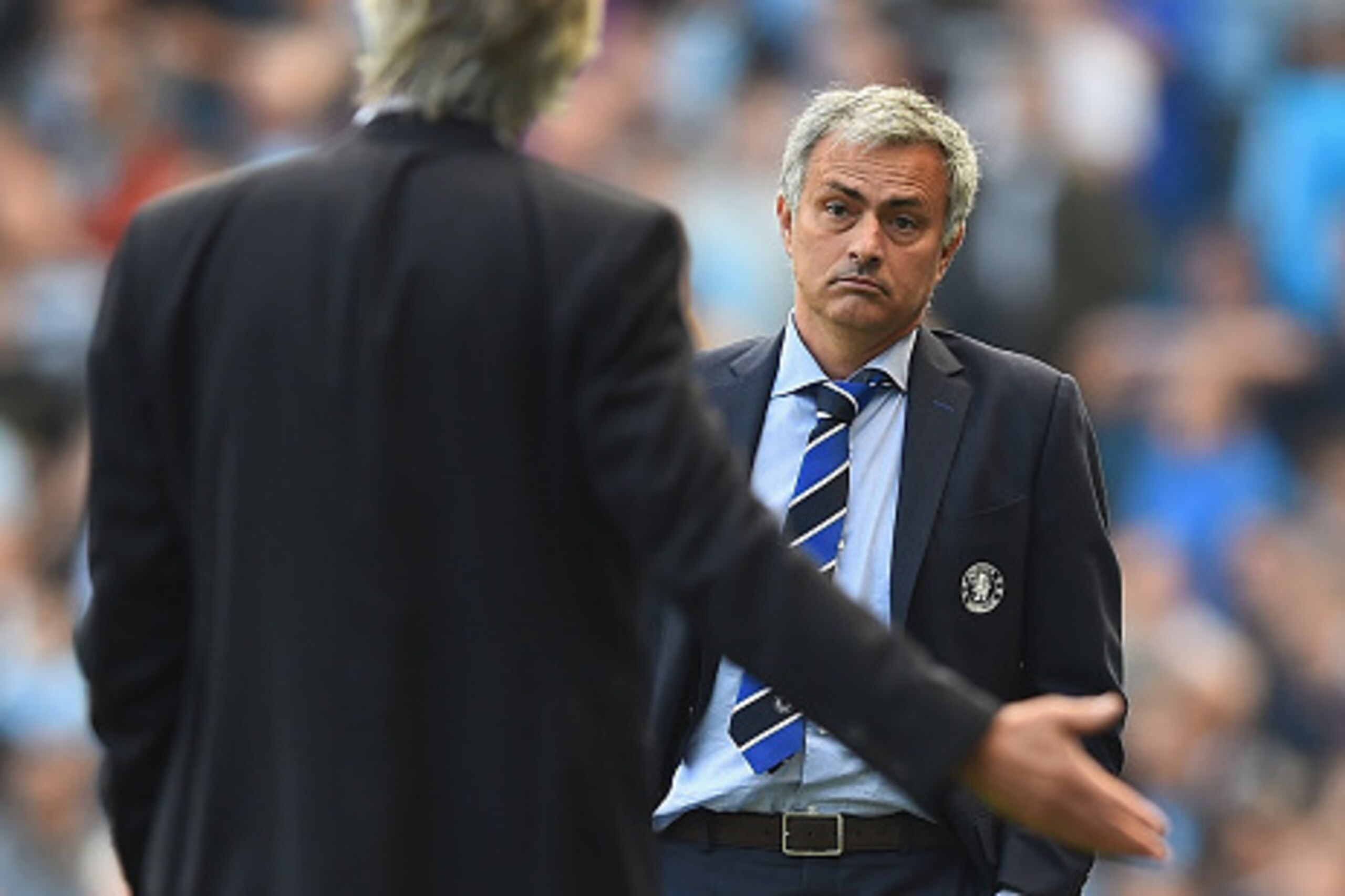 MANCHESTER, ENGLAND - SEPTEMBER 21: Jose Mourinho of Chelsea speaks with Manuel Pellegrini of Manchester City during the Barclays Premier League match between Manchester City and Chelsea at Etihad Stadium on September 21, 2014 in Manchester, England.  (Ph