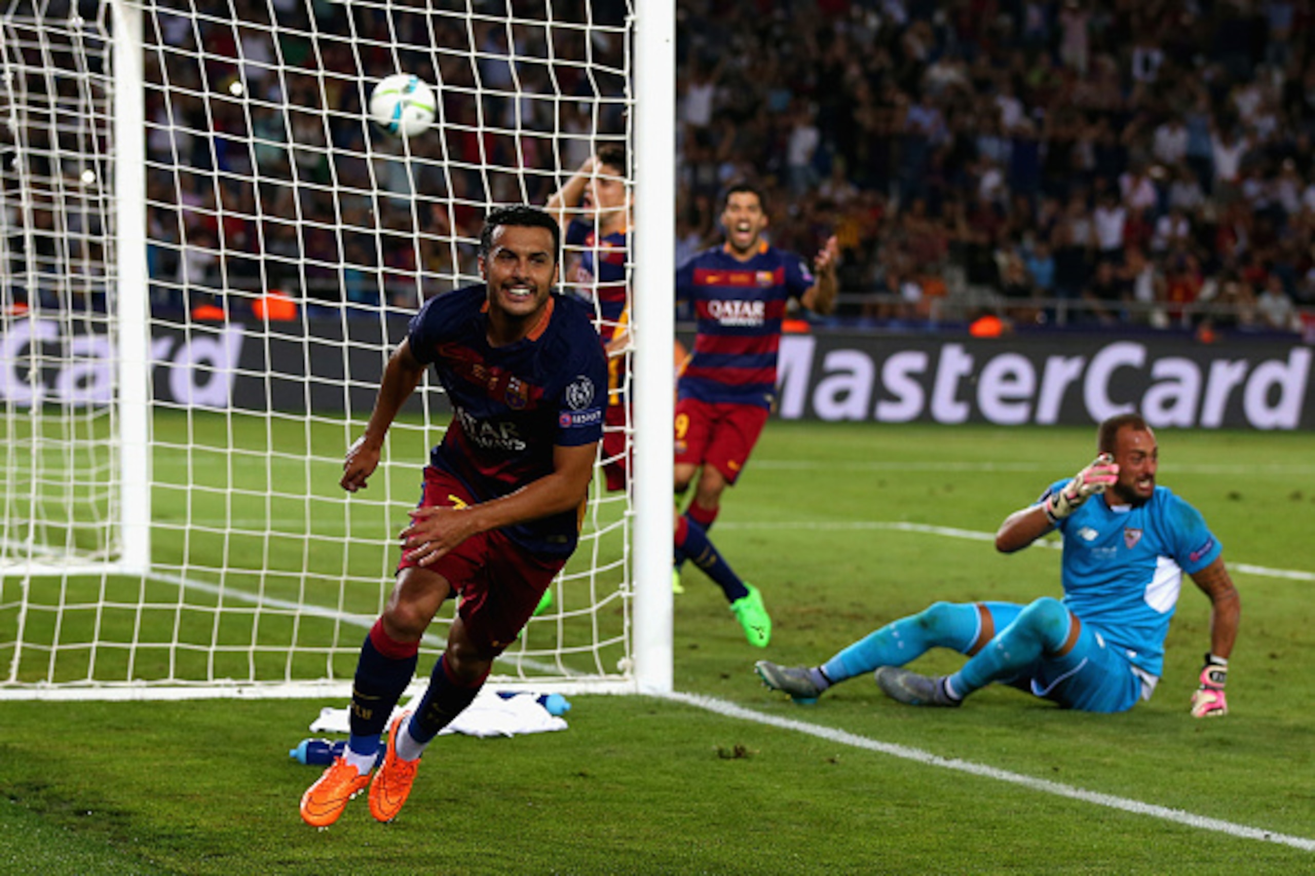 TBILISI, GEORGIA - AUGUST 11:  Pedro of Barcelona celebrates scoring their fifth goal past Beto of Sevilla in extra time during the UEFA Super Cup between Barcelona and Sevilla FC at Dinamo Arena on August 11, 2015 in Tbilisi, Georgia.  (Photo by Chris Br