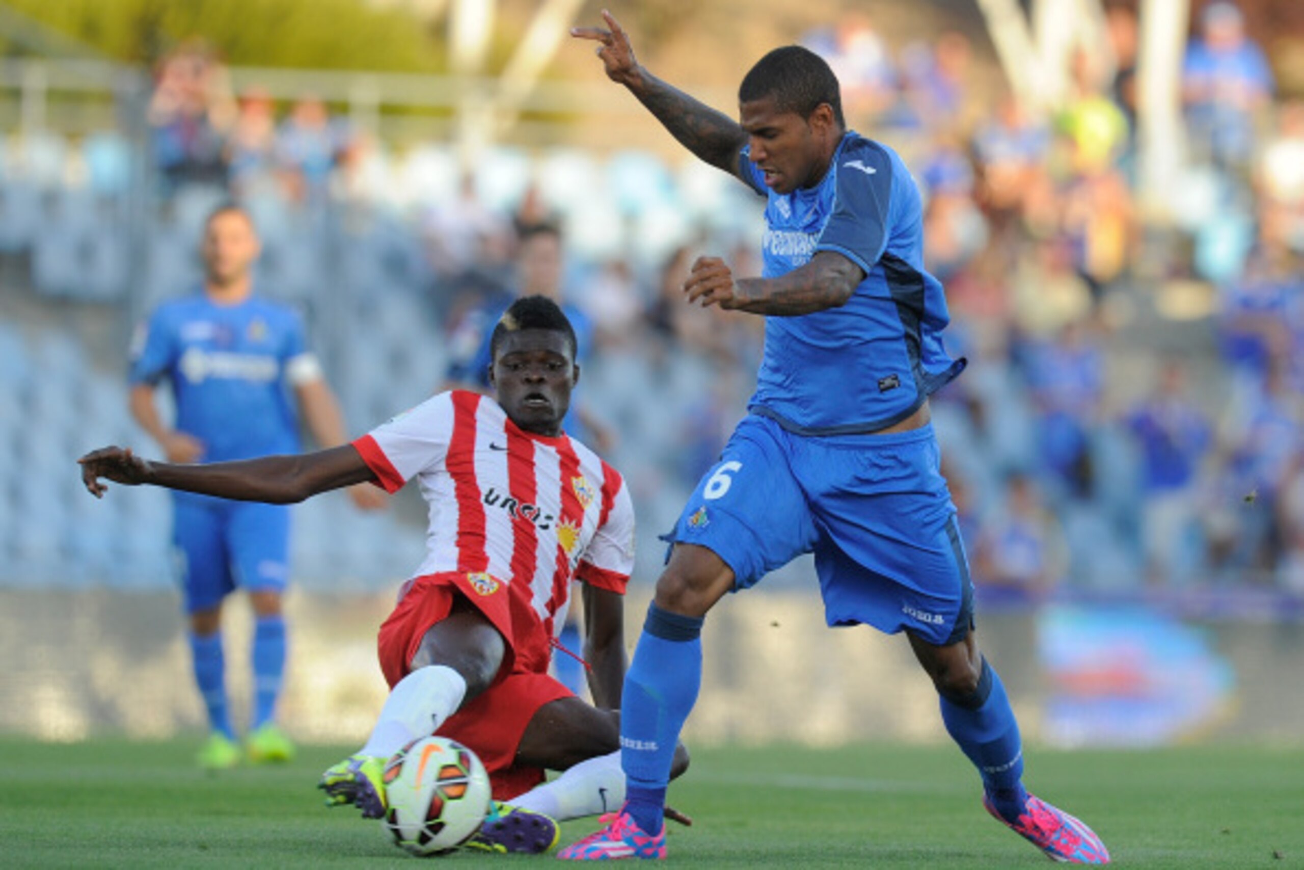 GETAFE, SPAIN - AUGUST 29:  Jorge Sammir (R) of Getafe CF is tackled by Thomas Partey of UD Almeria during the La Liga match between Getafe CF and UD Almeria at Coliseum Alfonso Perez on August 29, 2014 in Getafe, Spain.  (Photo by Denis Doyle/Getty Image