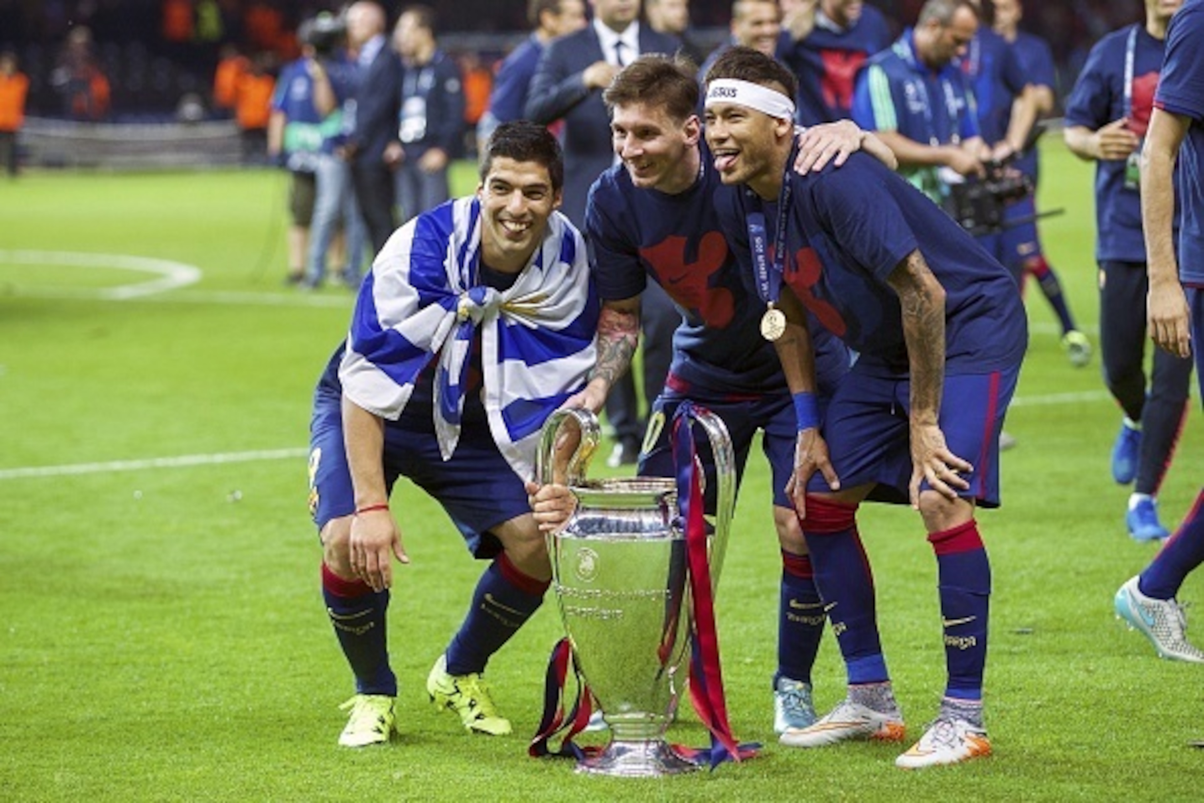 (L-R) Luis Suarez of FC Barcelona, Lionel Messi of FC Barcelona, Neymar of FC Barcelona with trophy during the UEFA Champions League  final match between Barcelona and Juventus on June 6, 2015 at the Olympic stadium in Berlin, Germany.(Photo by VI Images 
