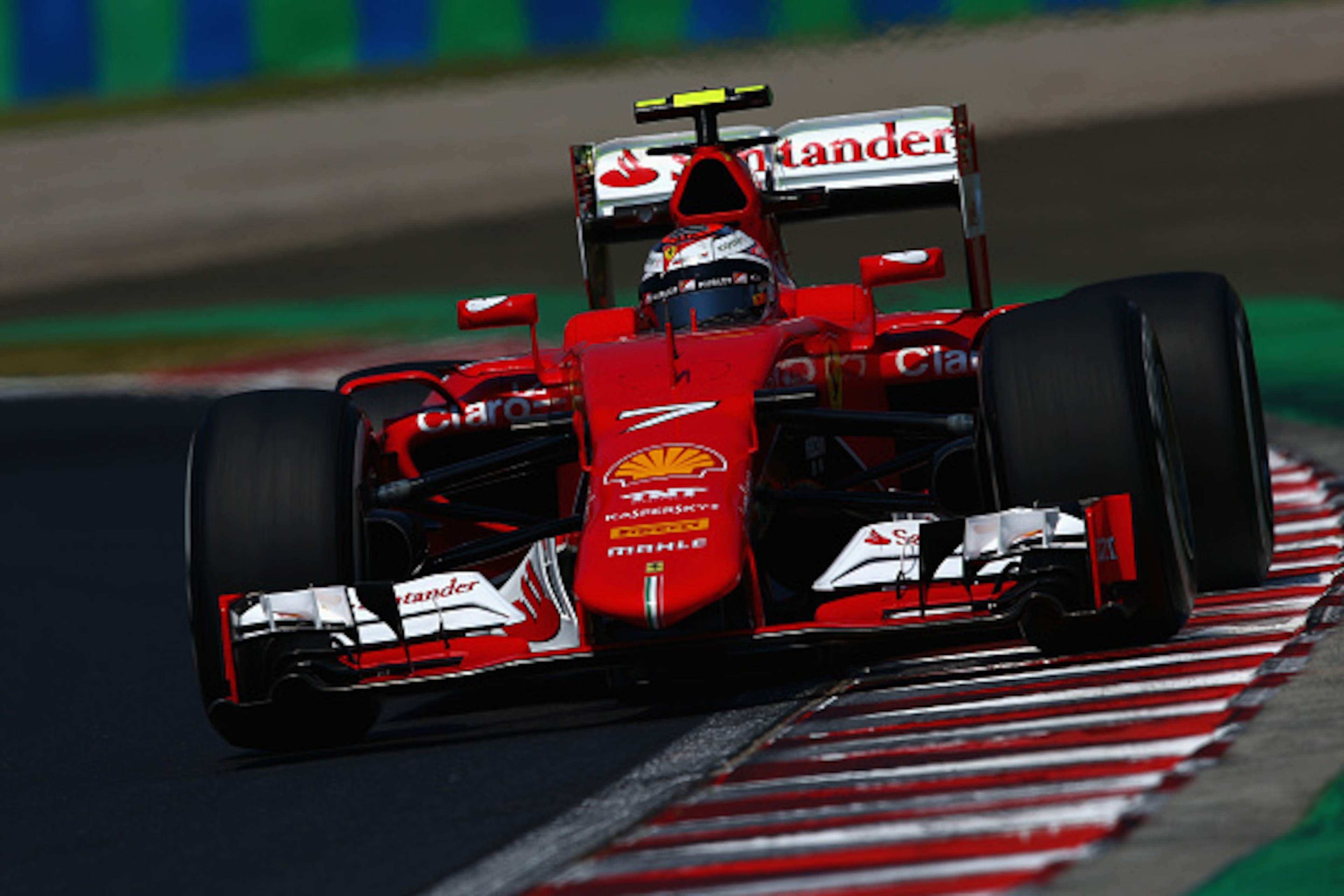 BUDAPEST, HUNGARY - JULY 24:  Kimi Raikkonen of Finland and Ferrari drives during practice for the Formula One Grand Prix of Hungary at Hungaroring on July 24, 2015 in Budapest, Hungary.  (Photo by Clive Mason/Getty Images)