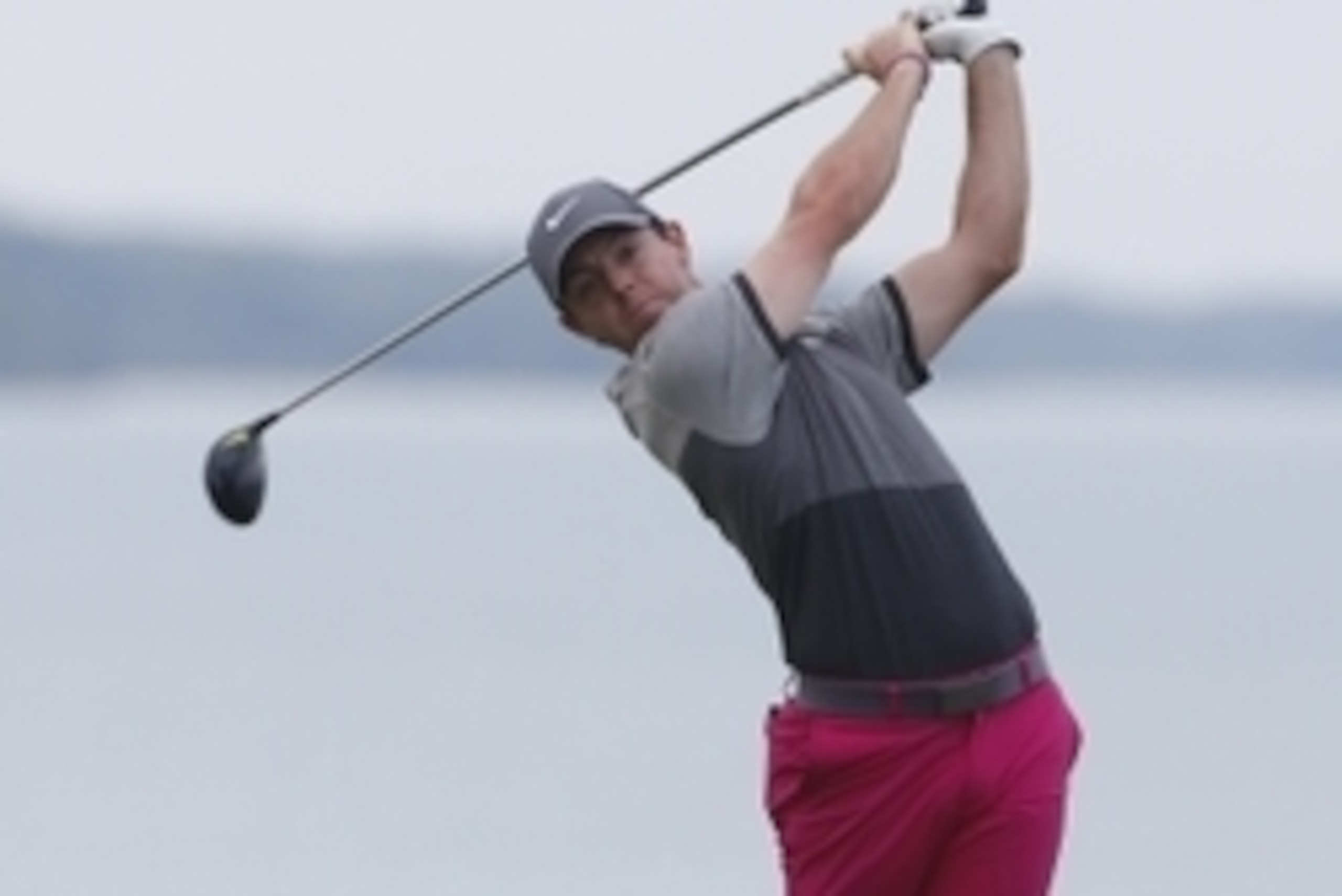 Aug 13, 2015; Sheboygan, WI, USA; Rory McIlroy hits his tee shot on the 16th hole during the first round of the 2015 PGA Championship golf tournament at Whistling Straits. Mandatory Credit: Brian Spurlock-USA TODAY Sports