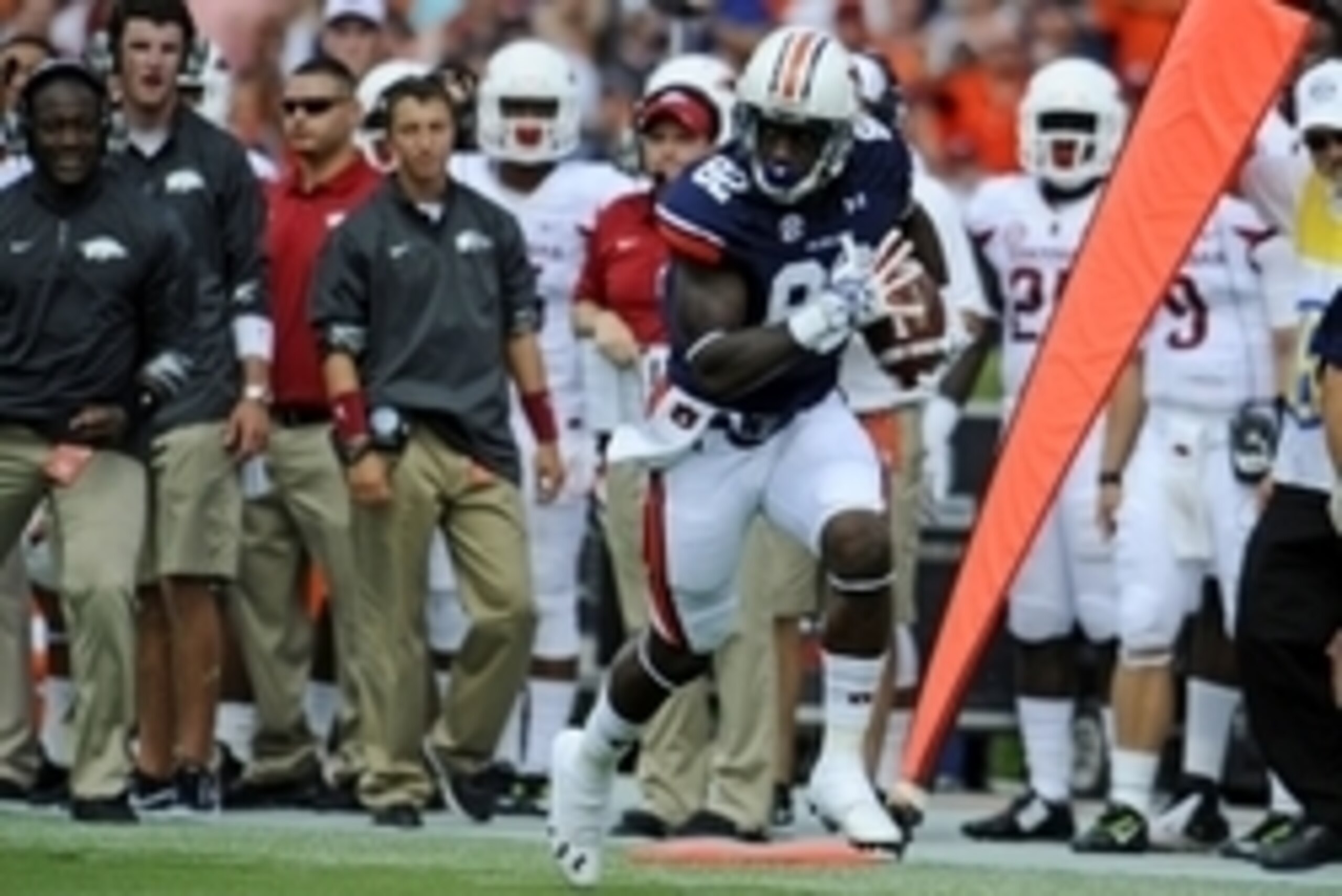 Aug 30, 2014; Auburn, AL, USA; Auburn Tigers wide receiver Melvin Ray (82) scores a touchdown in the first quarter against the Arkansas Razorbacks at Jordan Hare Stadium. Mandatory Credit: Shanna Lockwood-USA TODAY Sports Aug 30, 2014; Auburn, AL, USA; Auburn Tigers wide receiver Melvin Ray (82) scores a touchdown in the first quarter against the Arkansas Razorbacks at Jordan Hare Stadium. Mandatory Credit: Shanna Lockwood-USA TODAY Sports