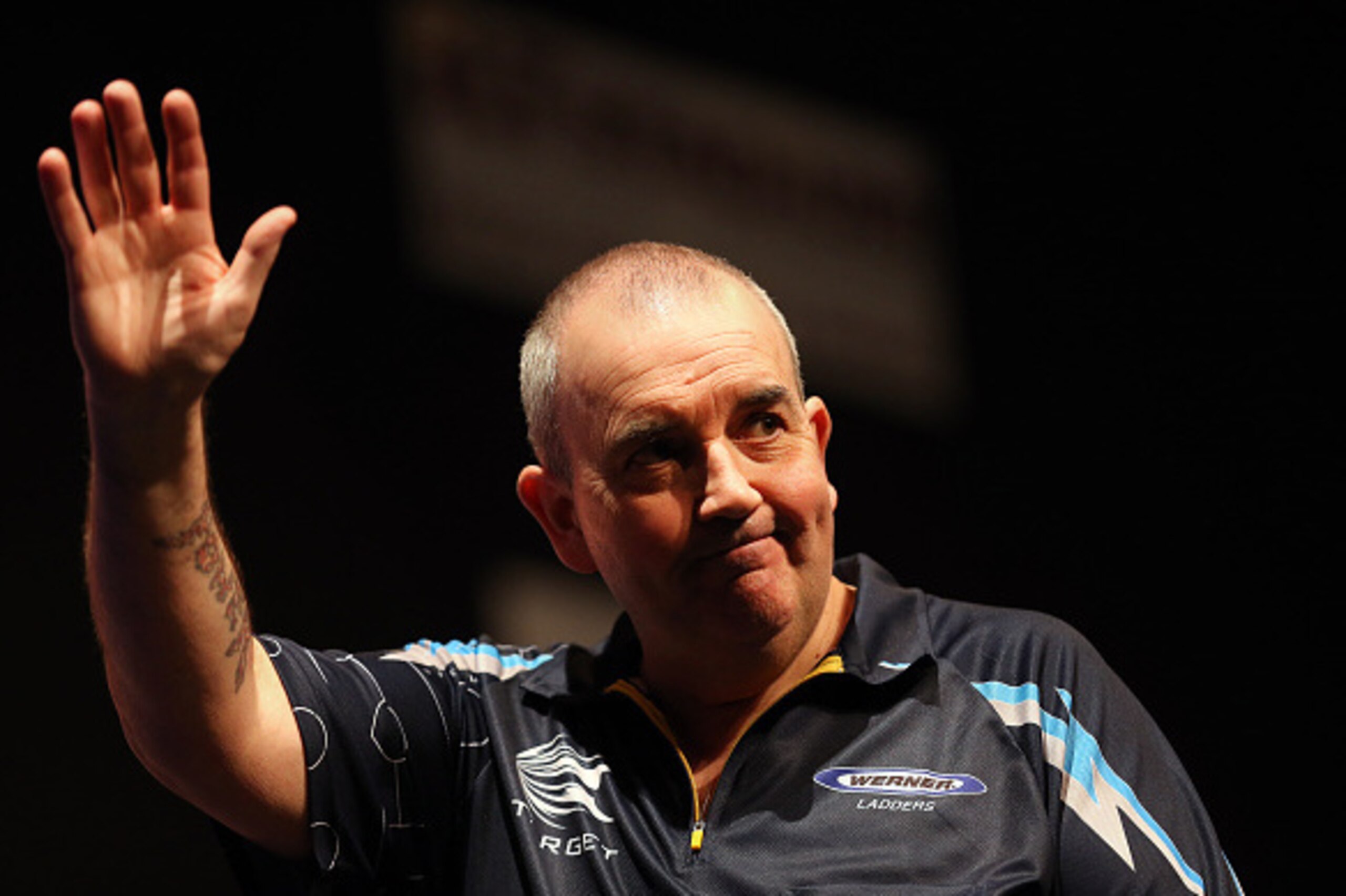 INVERCARGILL, NEW ZEALAND - JANUARY 12:  Phil Taylor of England at the Darts King Australasia tournament on January 12, 2015 at ILT Stadium Southland in Invercargill, New Zealand. (Photo by Dianne Manson/Getty Images)