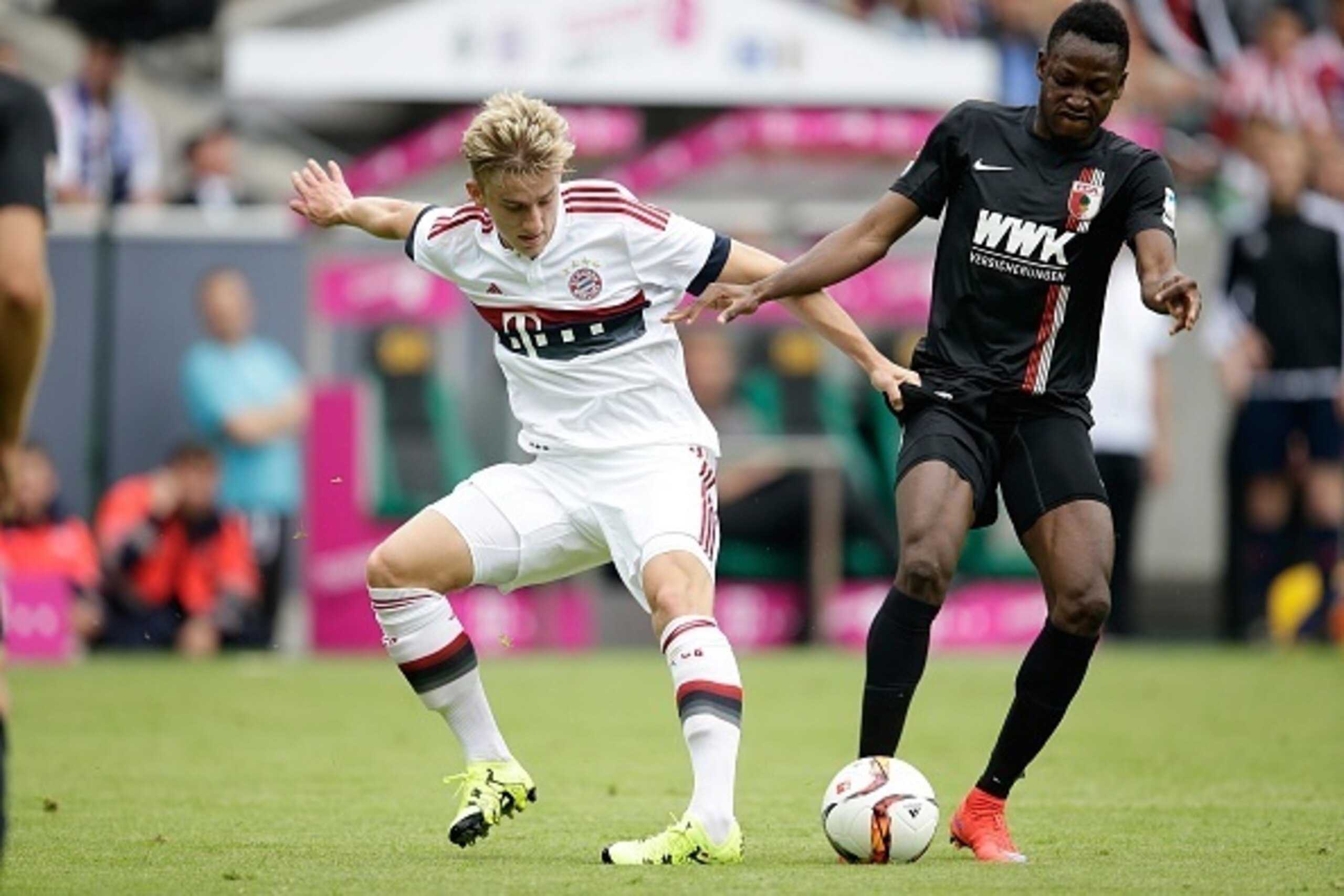 (L-R) Sinan Kurt of FC Bayern Munchen, Abdul Rahman Baba of FC Augsburg during the Telekom Cup friendly match between Bayern Munich and FC Augsburg on July 12, 2015 at the Borussia Park stadium in Monchengladbach, Germany.(Photo by VI Images via Getty Ima
