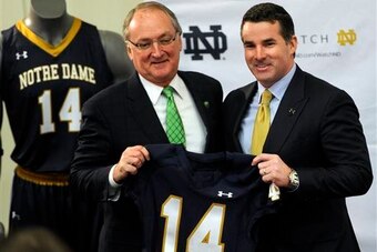 Notre Dame AD Jack Swarbrick and Under Armour CEO Kevin Plank in January 2014
