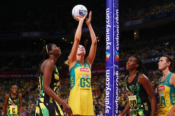 SYDNEY, AUSTRALIA - AUGUST 15:  Caitlin Bassett of the Diamonds shoots during the 2015 Netball World Cup Semi Final 2 match between Australia and Jamaica at Allphones Arena on August 15, 2015 in Sydney, Australia.  (Photo by Matt King/Getty Images)
