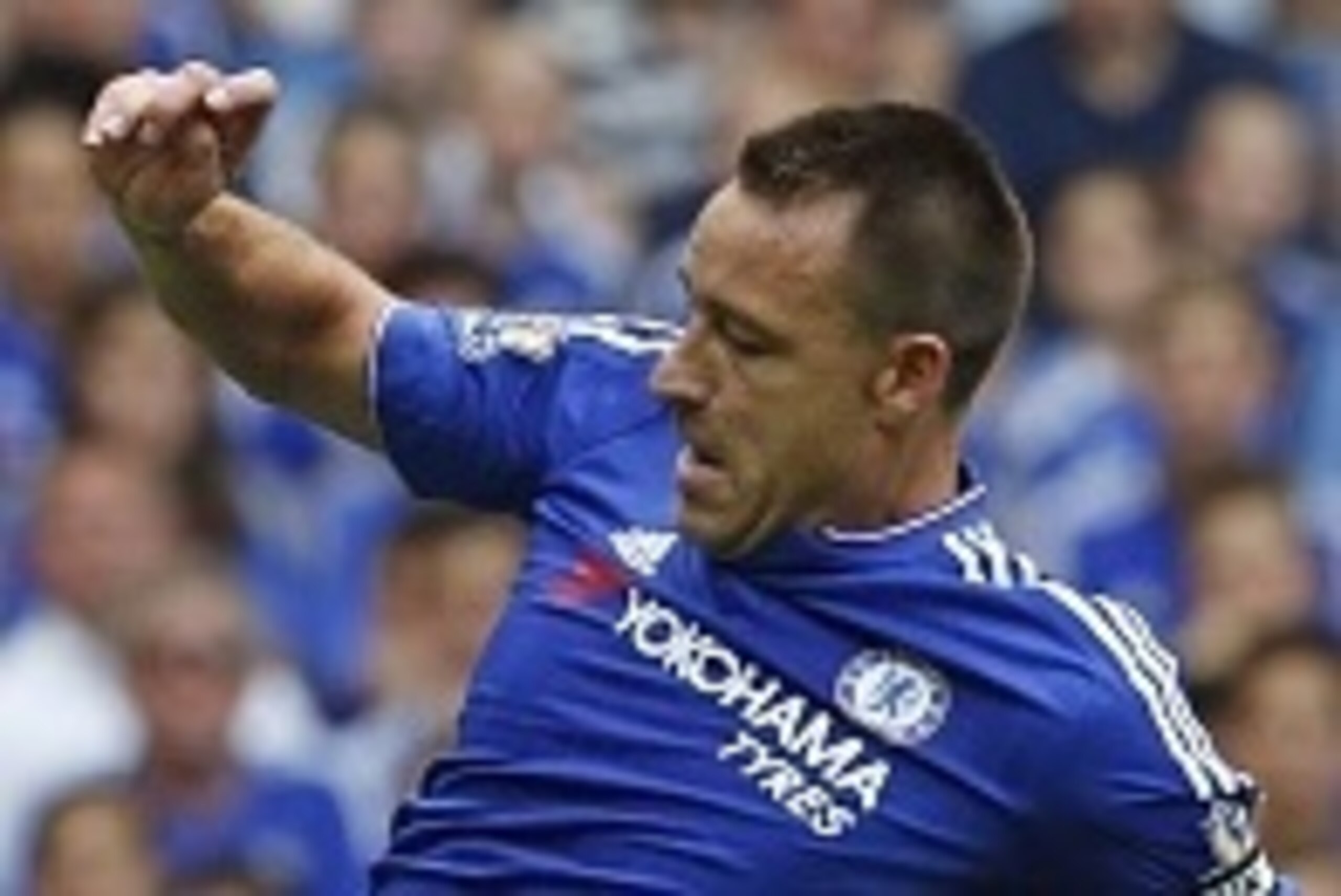 Chelsea's English defender John Terry (L) blocks a shot from Swansea City's French striker Bafetimbi Gomis (R) during the English Premier League football match between Chelsea and Swansea City at Stamford Bridge in London on August 8, 2015. AFP PHOTO / IA