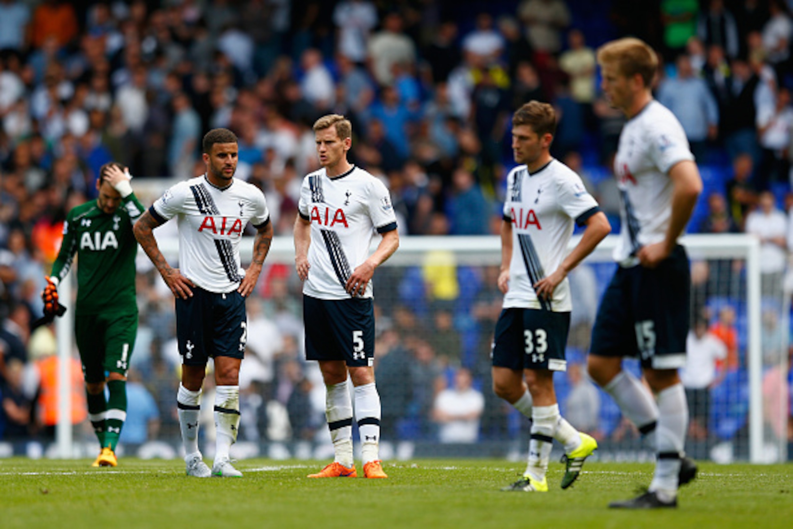 LONDON, ENGLAND - AUGUST 15: Tottenham players show thier frustration after the 2-2 draw in the Barclays Premier League match between Tottenham Hotspur and Stoke City at White Hart Lane on August 15, 2015 in London, United Kingdom.  (Photo by Julian Finne