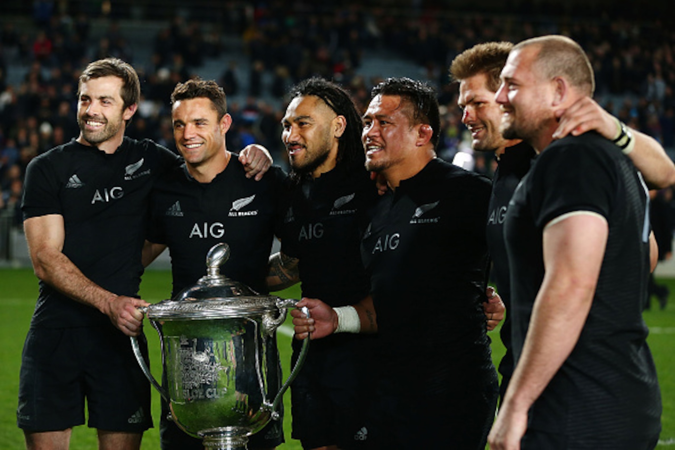 AUCKLAND, NEW ZEALAND - AUGUST 15: (L-R) Conrad Smith, Daniel Carter, Ma'a Nonu, Keven Mealamu, Richie McCaw and Tony Woodcock of New Zealand celebrate with the Bledisloe Cup after winning The Rugby Championship, Bledisloe Cup match between the New Zealan