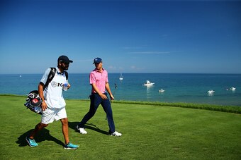 SHEBOYGAN, WI - AUGUST 15:  Jordan Spieth of the United States and caddie Mike Greller during the third round of the 2015 PGA Championship at Whistling Straits  at  on August 15, 2015 in Sheboygan, Wisconsin.  (Photo by Richard Heathcote/Getty Images)