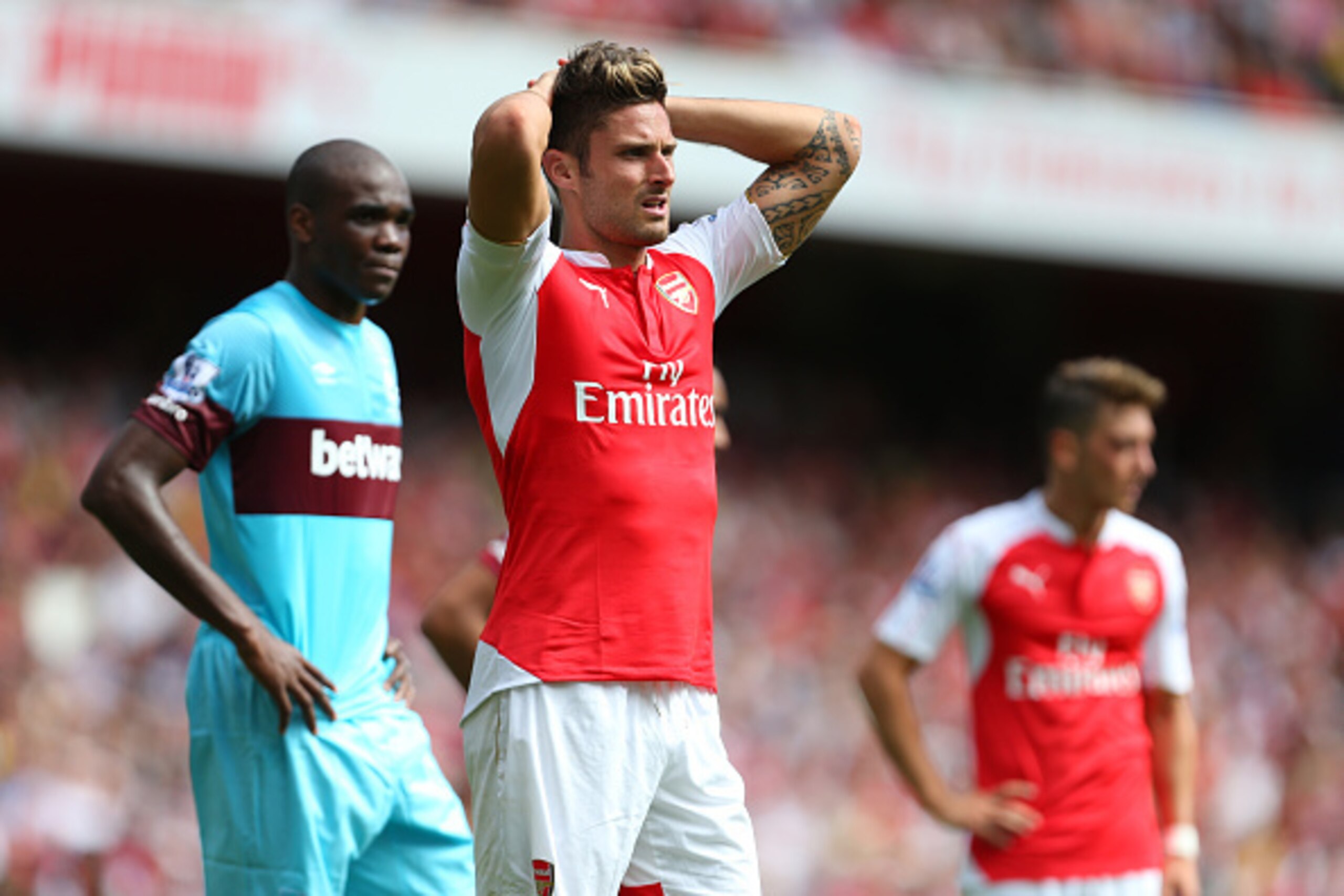 LONDON, ENGLAND - AUGUST 09: Olivier Giroud of Arsenal puts his hands on his head during the Barclays Premier League match between Arsenal and West Ham United at Emirates Stadium on August 9, 2015 in London, England. (Photo by Catherine Ivill - AMA/Gett LONDON, ENGLAND - AUGUST 09: Olivier Giroud of Arsenal puts his hands on his head during the Barclays Premier League match between Arsenal and West Ham United at Emirates Stadium on August 9, 2015 in London, England. (Photo by Catherine Ivill - AMA/Gett