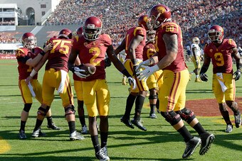 LOS ANGELES, CA - NOVEMBER 29:  Adoree' Jackson #2 of the USC Trojans celebrates his touchdown with Toa Lobendahn #50 to take a 14-0 lead over the Notre Dame Fighting Irish at Los Angeles Memorial Coliseum on November 29, 2014 in Los Angeles, California. 