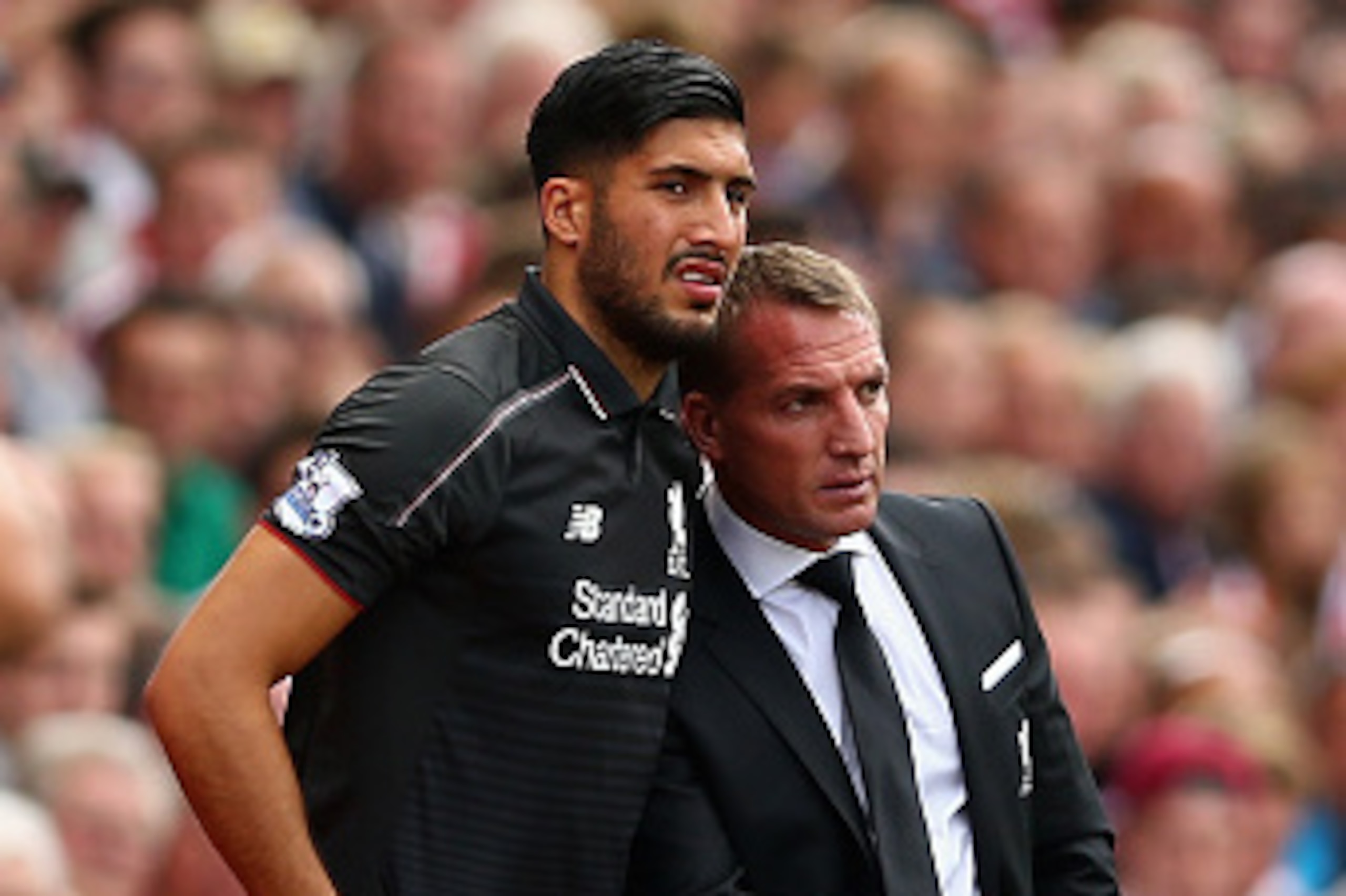 STOKE ON TRENT, ENGLAND - AUGUST 09:  Liverpool manager Brendan Rodgers discuses tactics with Emre Can during the Barclays Premier League match between Stoke City and Liverpool at Britannia Stadium on August 9, 2015 in Stoke on Trent, England.  (Photo by 