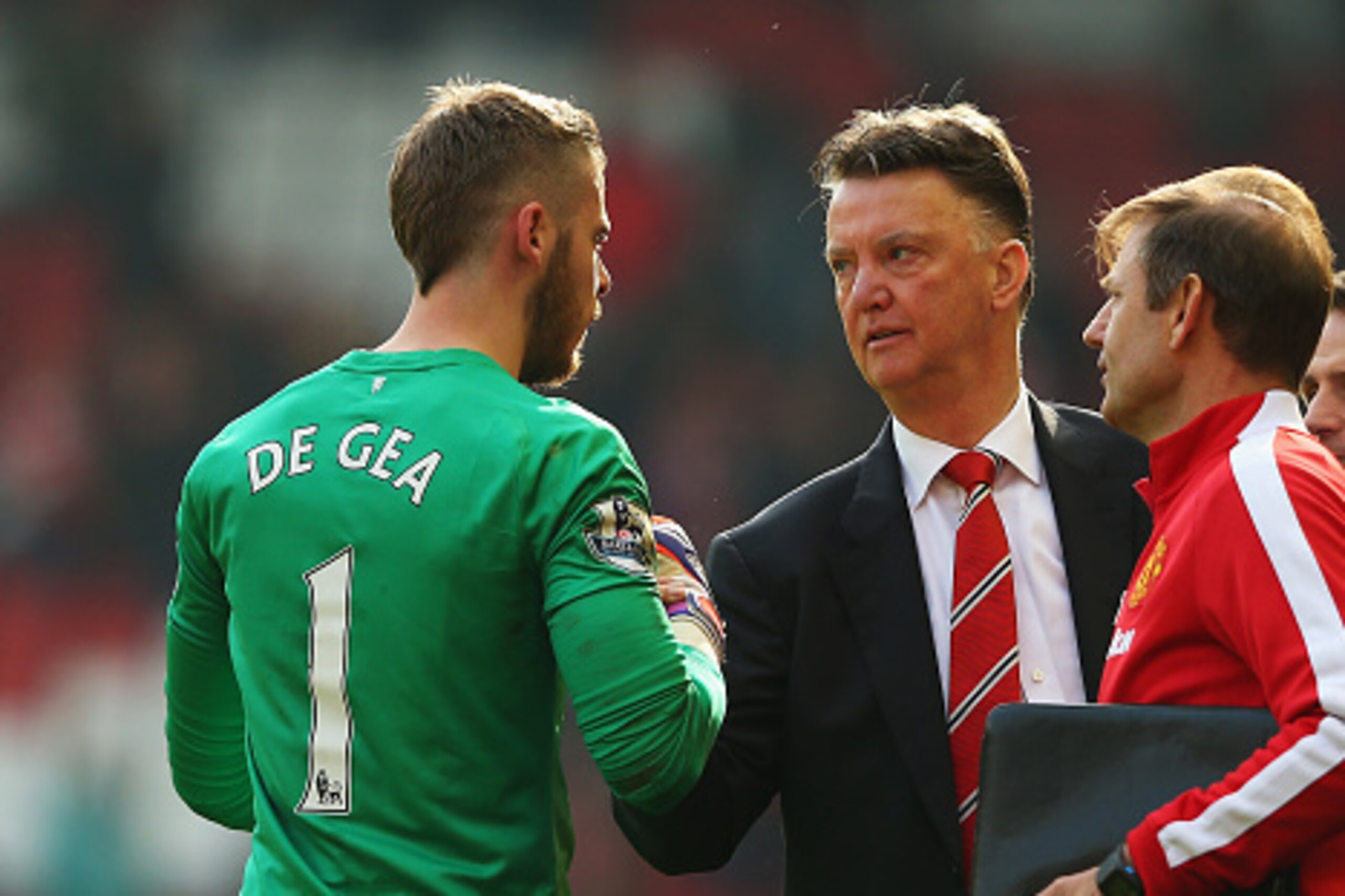 LIVERPOOL, ENGLAND - MARCH 22:  Louis van Gaal, manager of Manchester United celebrates victory with David De Gea of Manchester United after the Barclays Premier League match between Liverpool and Manchester United at Anfield on March 22, 2015 in Liverpoo