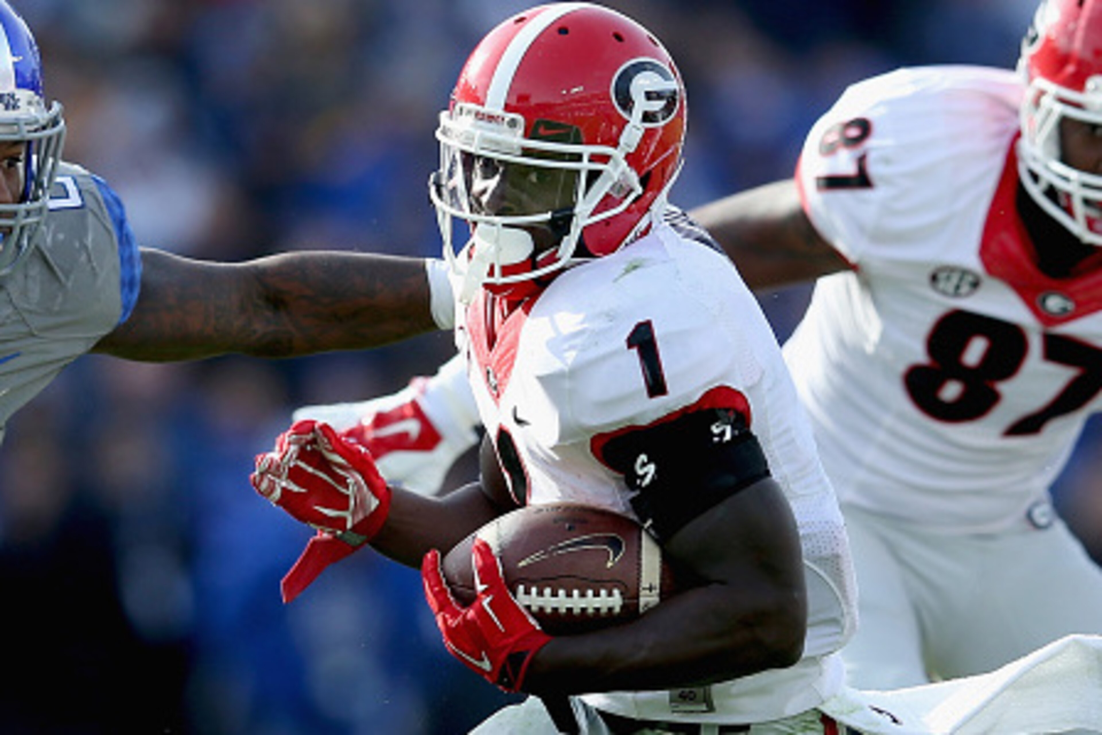 LEXINGTON, KY - NOVEMBER 08:  Sony Michel #1 of the Georgia Bulldogs runs for a touchdown during the game against the Kentucky Wildcats at Commonwealth Stadium on November 8, 2014 in Lexington, Kentucky.  (Photo by Andy Lyons/Getty Images)