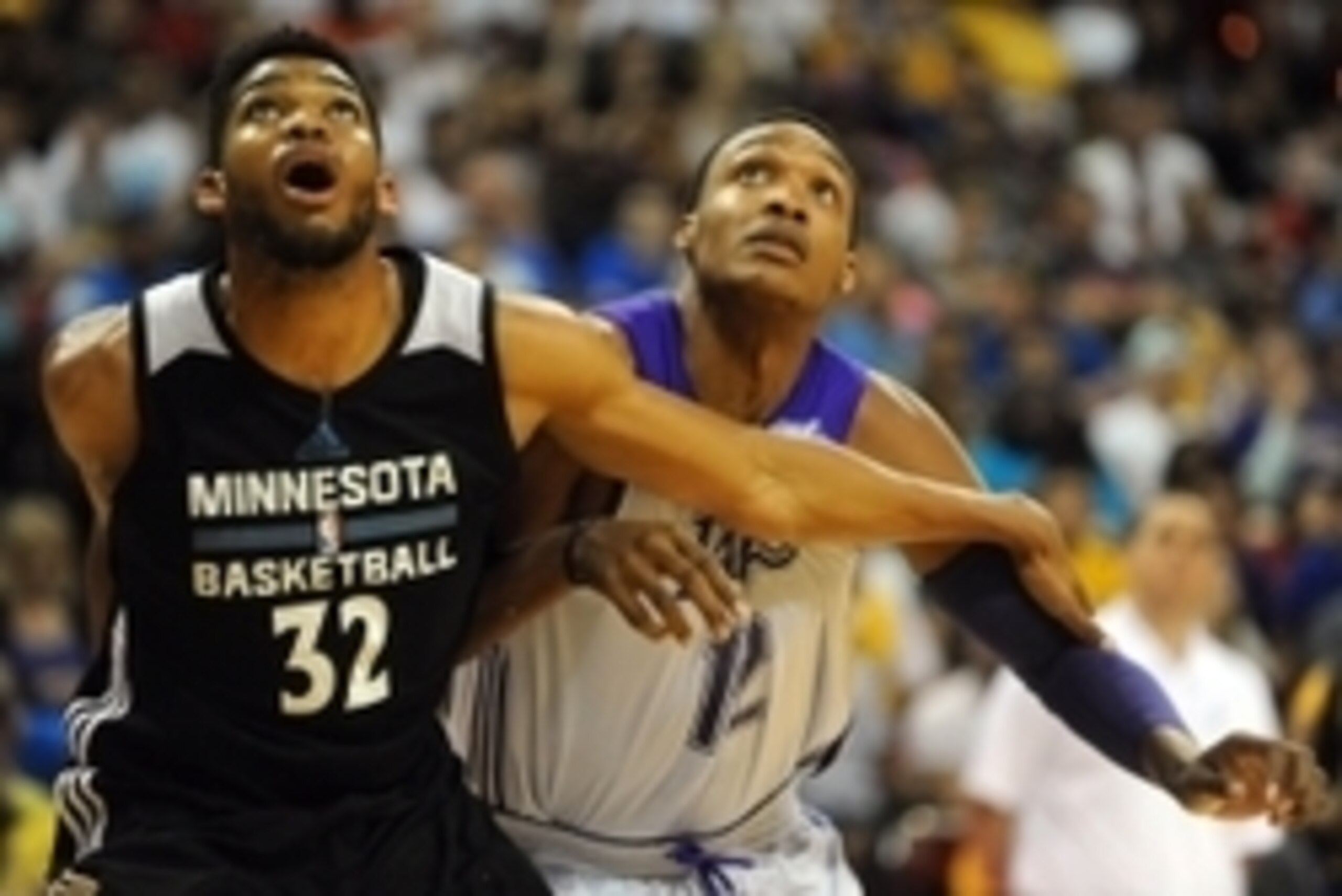 Jul 10, 2015; Las Vegas, NV, USA; Los Angeles Lakers center Robert Upshaw (12) is blocked out by Minnesota Timberwolves forward Karl-Anthony Towns (32) during an NBA Summer League game at Thomas & Mack Center. Mandatory Credit: Stephen R. Sylvanie-USA TOD