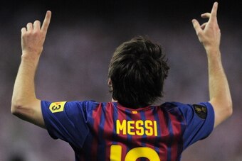 Barcelona's Argentinian forward Lionel Messi celebrates his goal during the Spanish King's Cup final match Athletic Bilbao vs FC Barcelona on May 25, 2012 at the Vicente Calderon stadium in Madrid.  AFP PHOTO / JOSEP LAGO        (Photo credit should read 