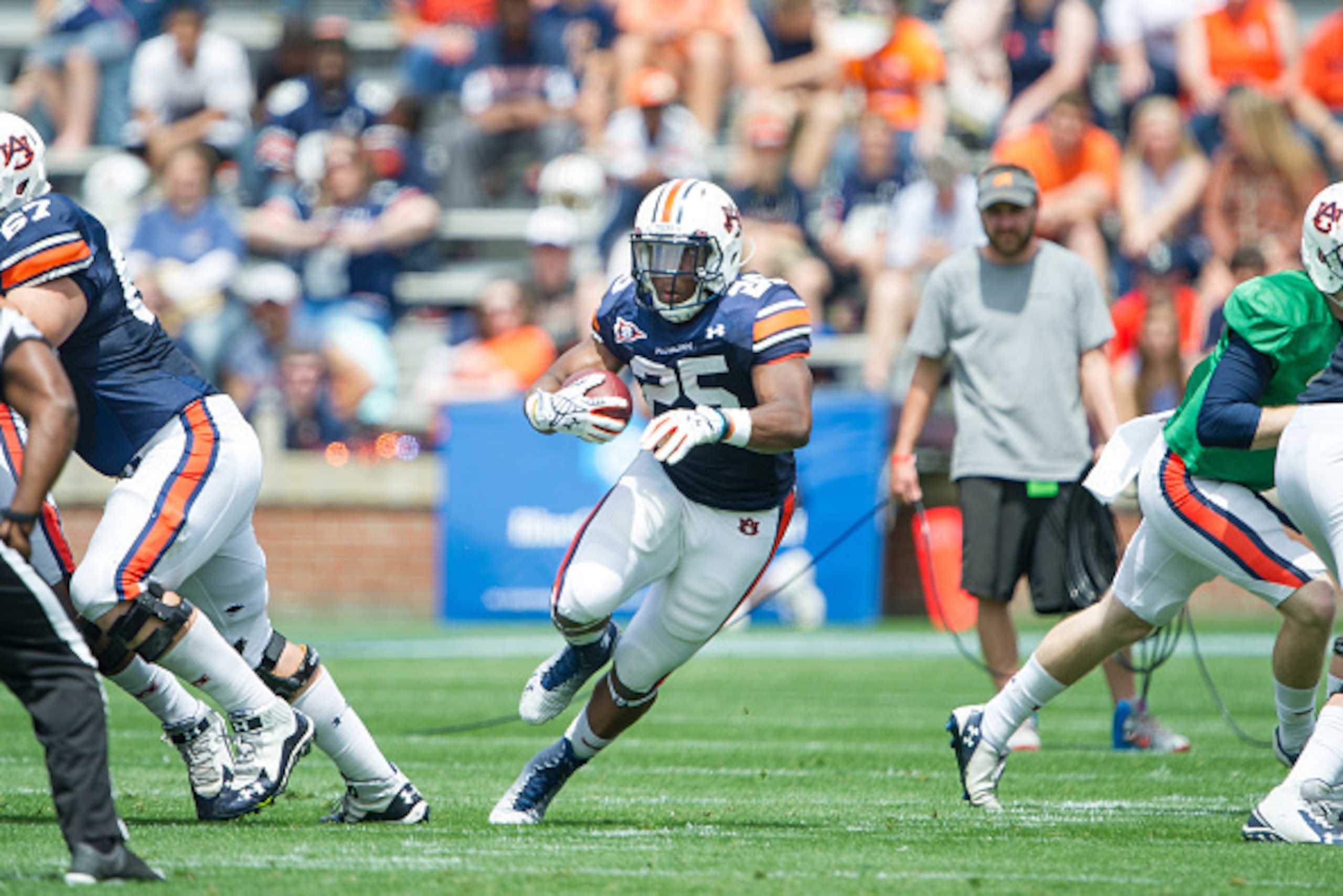 AUBURN, AL - APRIL 18: Peyton Barber #25 of Auburn Tigers run the ball through traffic during Auburn's A-Day game on April 18, 2015 at Jordan-Hare Stadium in Auburn, Alabama. (Photo by Michael Chang/Getty Images)