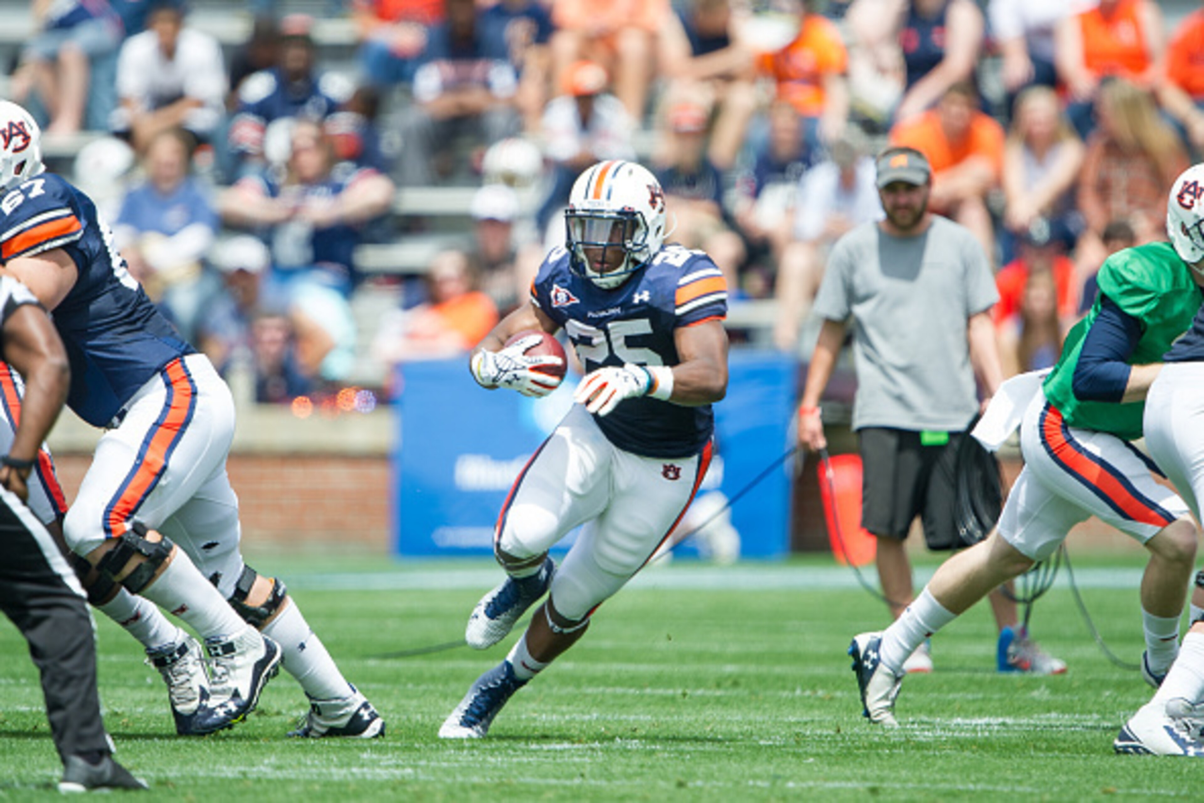 AUBURN, AL - APRIL 18: Peyton Barber #25 of Auburn Tigers run the ball through traffic during Auburn's A-Day game on April 18, 2015 at Jordan-Hare Stadium in Auburn, Alabama. (Photo by Michael Chang/Getty Images)