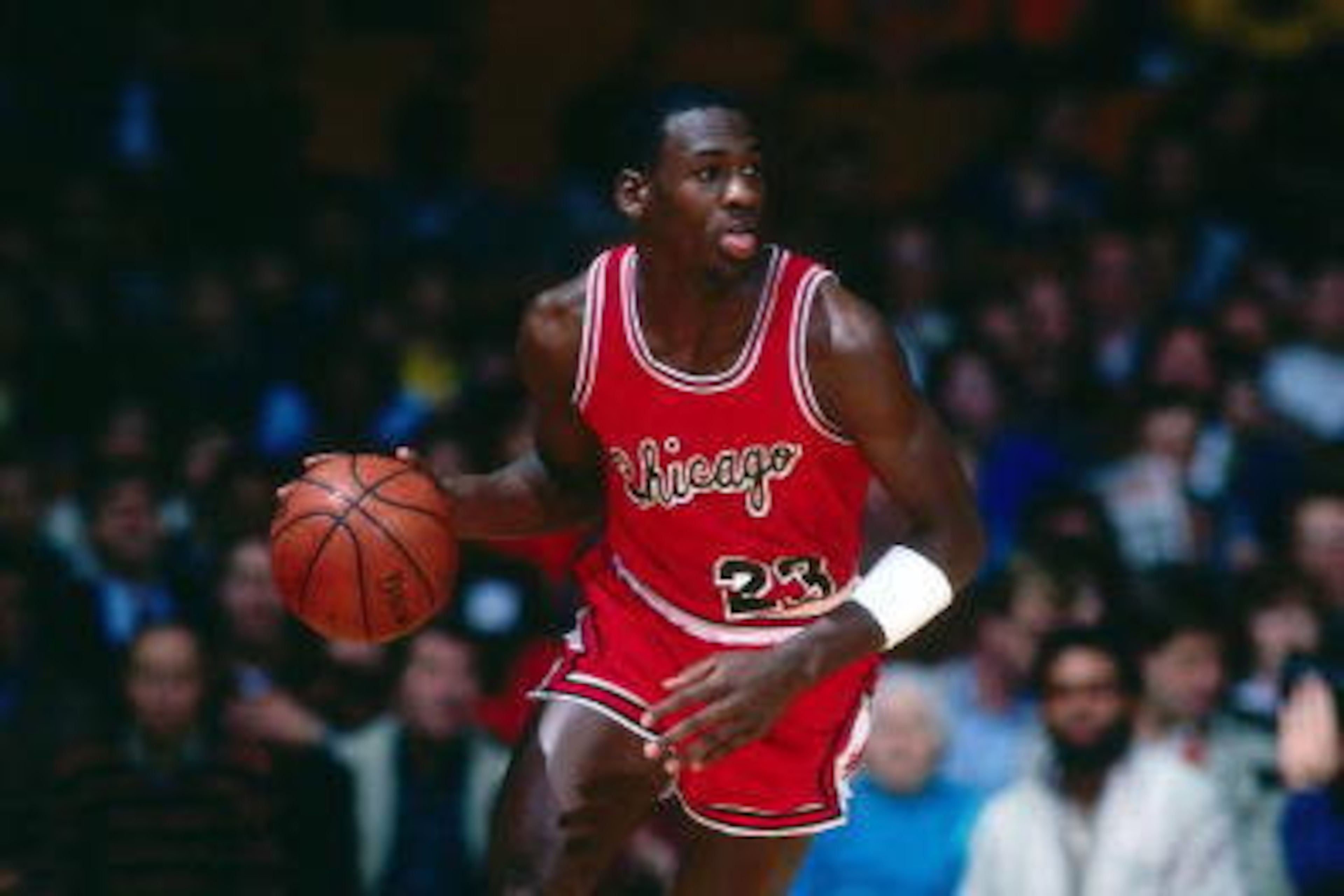 1985:  Michael Jordan #23 of the Chicago Bulls moves the ball upcourt during a 1985 season NBA game.  NOTE TO USER: User expressly acknowledges and agrees that, by downloading and/or using this Photograph, User is consenting to the terms and conditions of