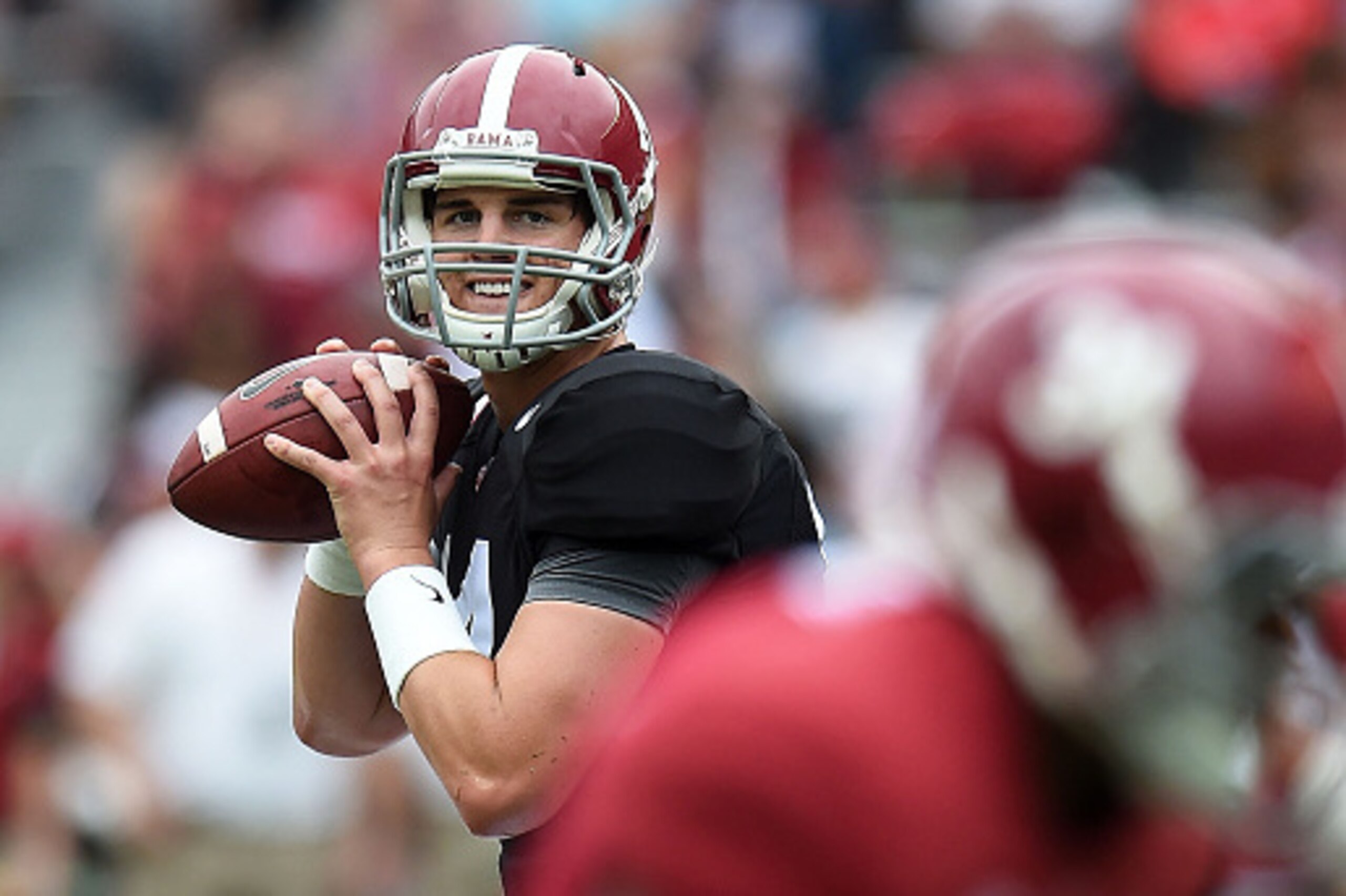 TUSCALOOSA, AL - APRIL 18:  Jake Coker #14 of the White team participates in warmups prior to the University of Alabama Crimson Tide A-day spring game at Bryant-Denny Stadium on April 18, 2015 in Tuscaloosa, Alabama.  (Photo by Stacy Revere/Getty Images)