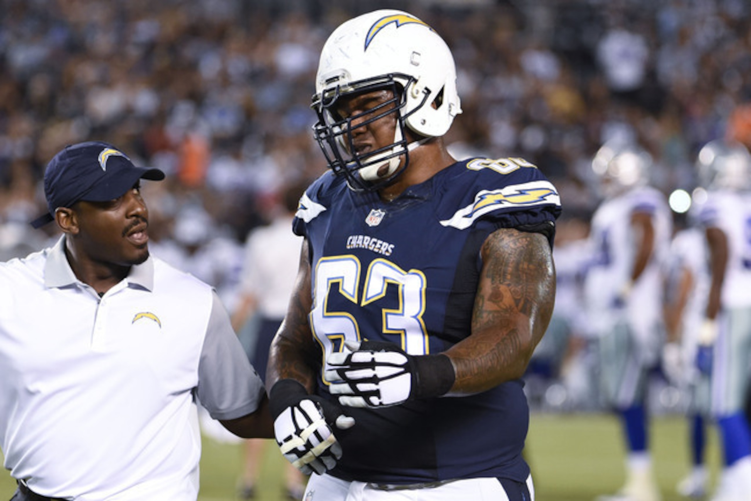 What does Chargers guard Johnnie Troutman have to show for Thursday's preseason game? A broken arm.