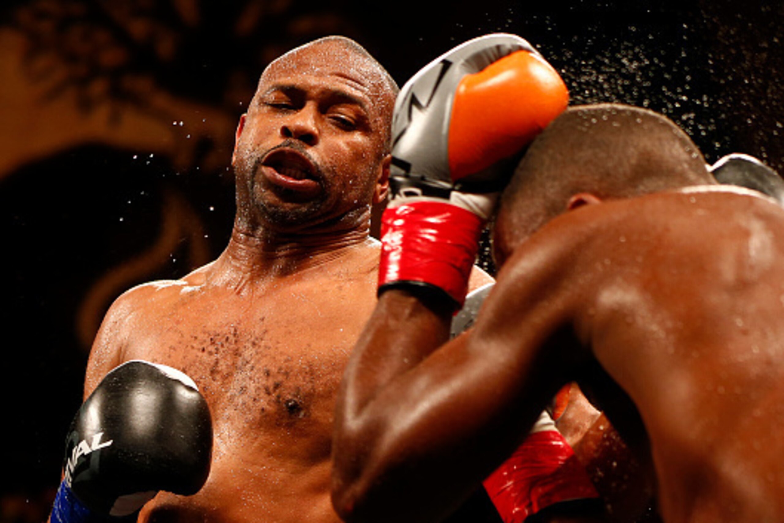 MASHANTUCKET, CT - AUGUST 16: Roy Jones Jr. lands a left punch to the head of Eric Watkins during their bout in the season two finale of NUVOtvÕs Knockout at Foxwoods Resort Casino on August 16, 2015 in Mashantucket, Connecticut. Jones won by a knockout i