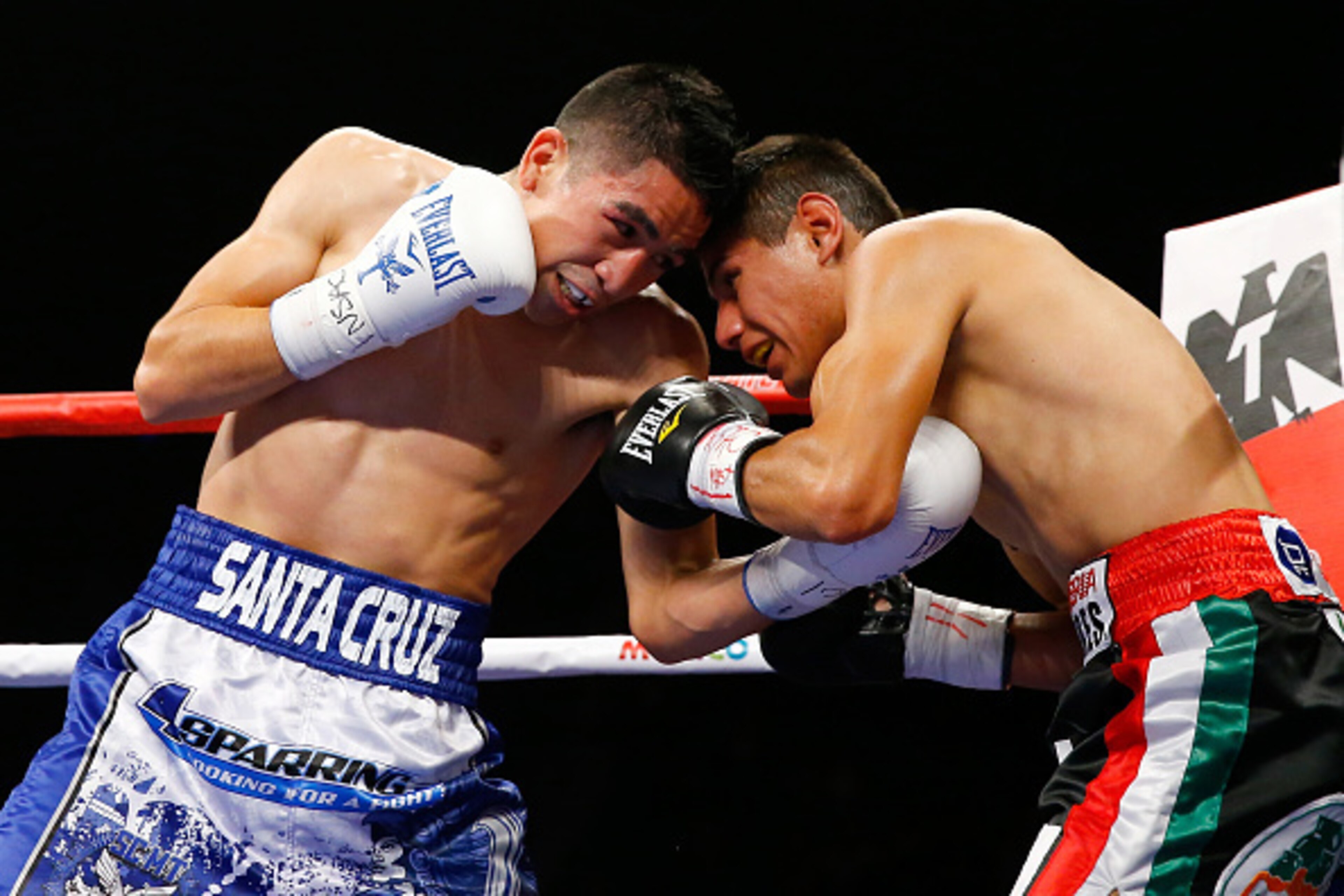 LAS VEGAS, NV - MAY 02:  Leo Santa Cruz (L) throws a left at Jose Cayetano during their featherweight bout on May 2, 2015 at MGM Grand Garden Arena in Las Vegas, Nevada.  (Photo by Al Bello/Getty Images)