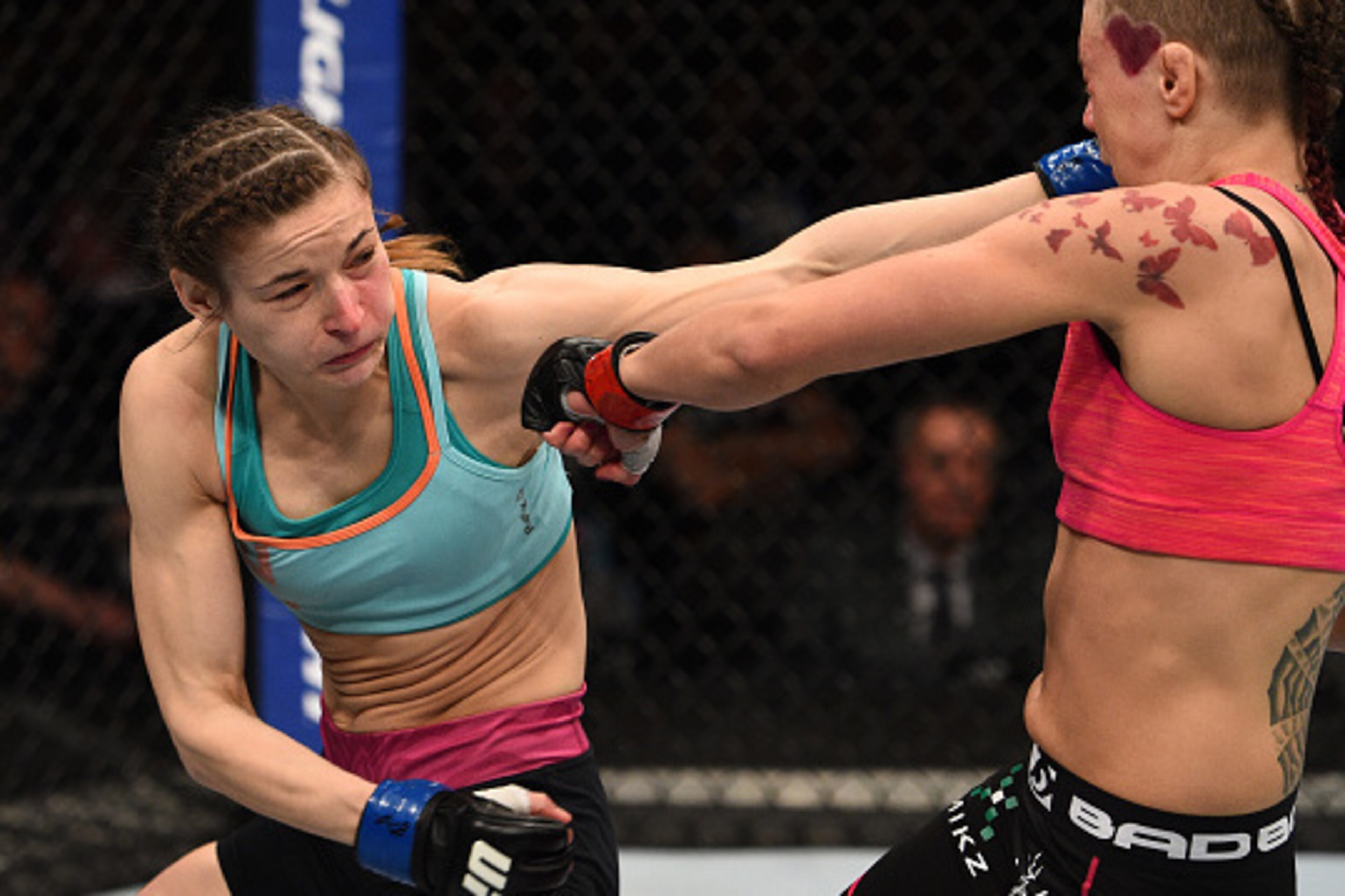 KRAKOW, POLAND - APRIL 11: (L-R) Maryna Moroz of Croatia punches Joanne Calderwood of Scotland in their women's strawweight fight during the UFC Fight Night event at the Tauron Arena on April 11, 2015 in Krakow, Poland. (Photo by Jeff Bottari/Zuffa LLC/Z KRAKOW, POLAND - APRIL 11: (L-R) Maryna Moroz of Croatia punches Joanne Calderwood of Scotland in their women's strawweight fight during the UFC Fight Night event at the Tauron Arena on April 11, 2015 in Krakow, Poland. (Photo by Jeff Bottari/Zuffa LLC/Z
