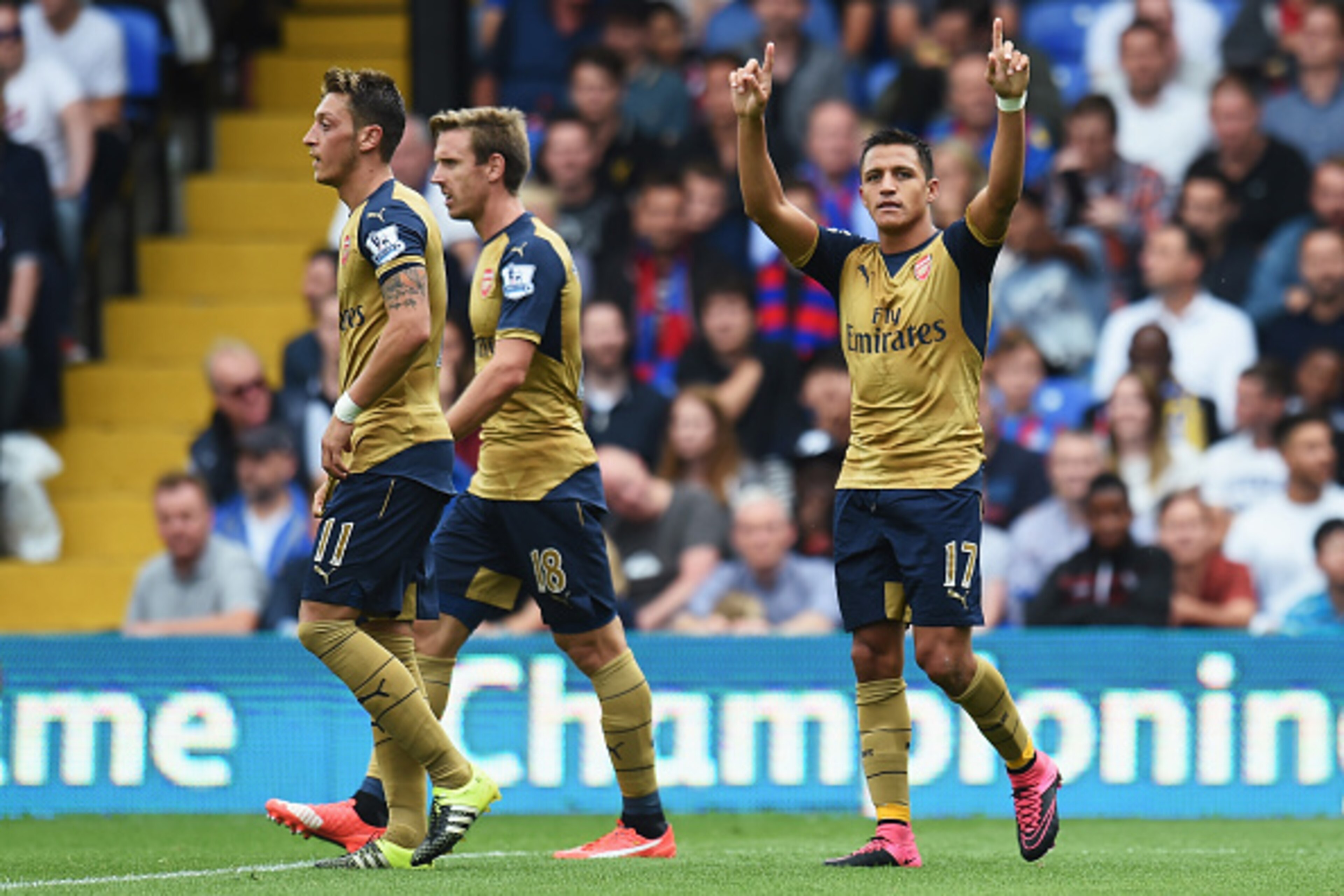 LONDON, ENGLAND - AUGUST 16: Alexis Sanchez of Arsenal celebrates the own goal scored by Damien Delaney of Crystal Palace during the Barclays Premier League match between Crystal Palace and Arsenal at Selhurst Park on August 16, 2015 in London, England.  