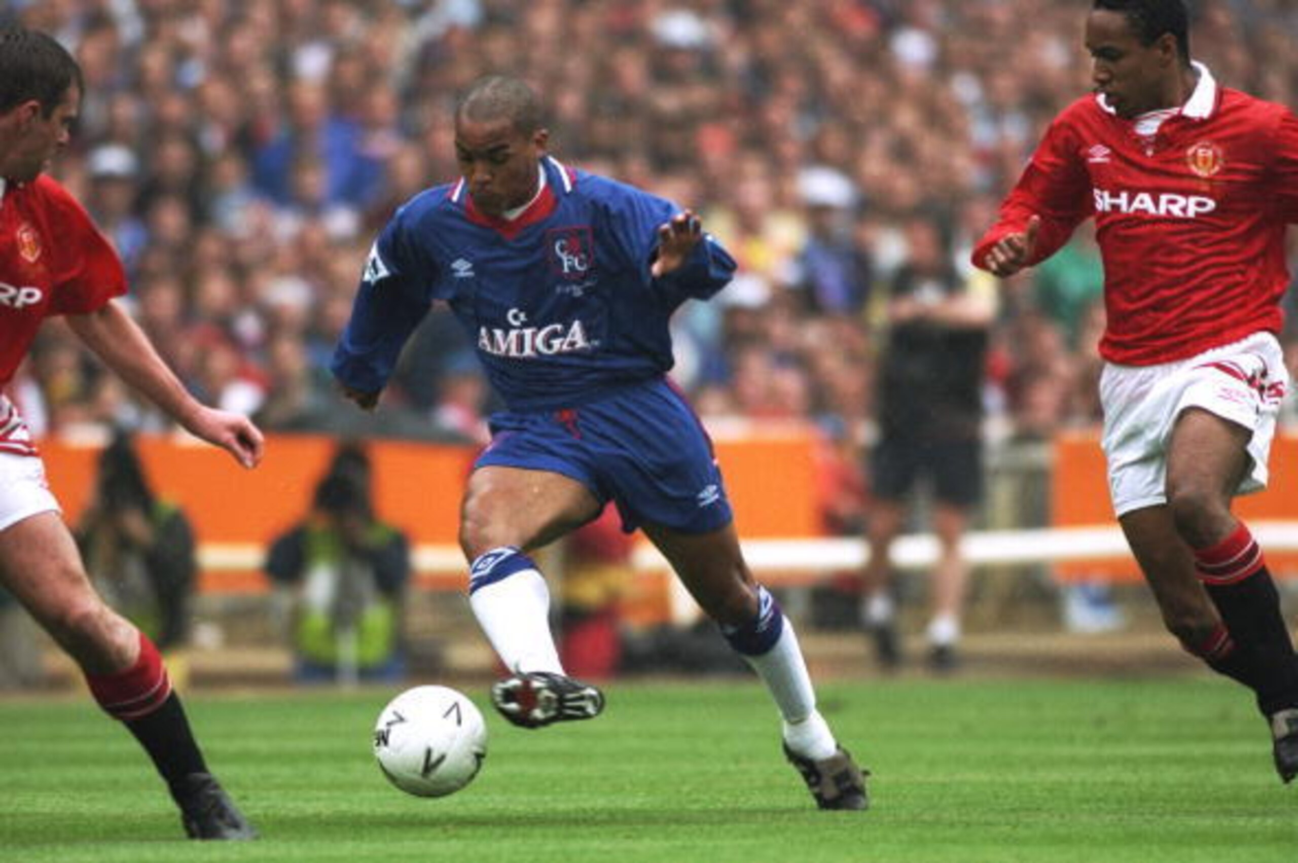 14 May 1994:  Mark Stein (centre) of Chelsea runs through the opposition's midfield during the FA Cup Final against Manchester United at Wembley Stadium in London. Manchester United won the match 4-0. \ Mandatory Credit: Allsport UK /Allsport