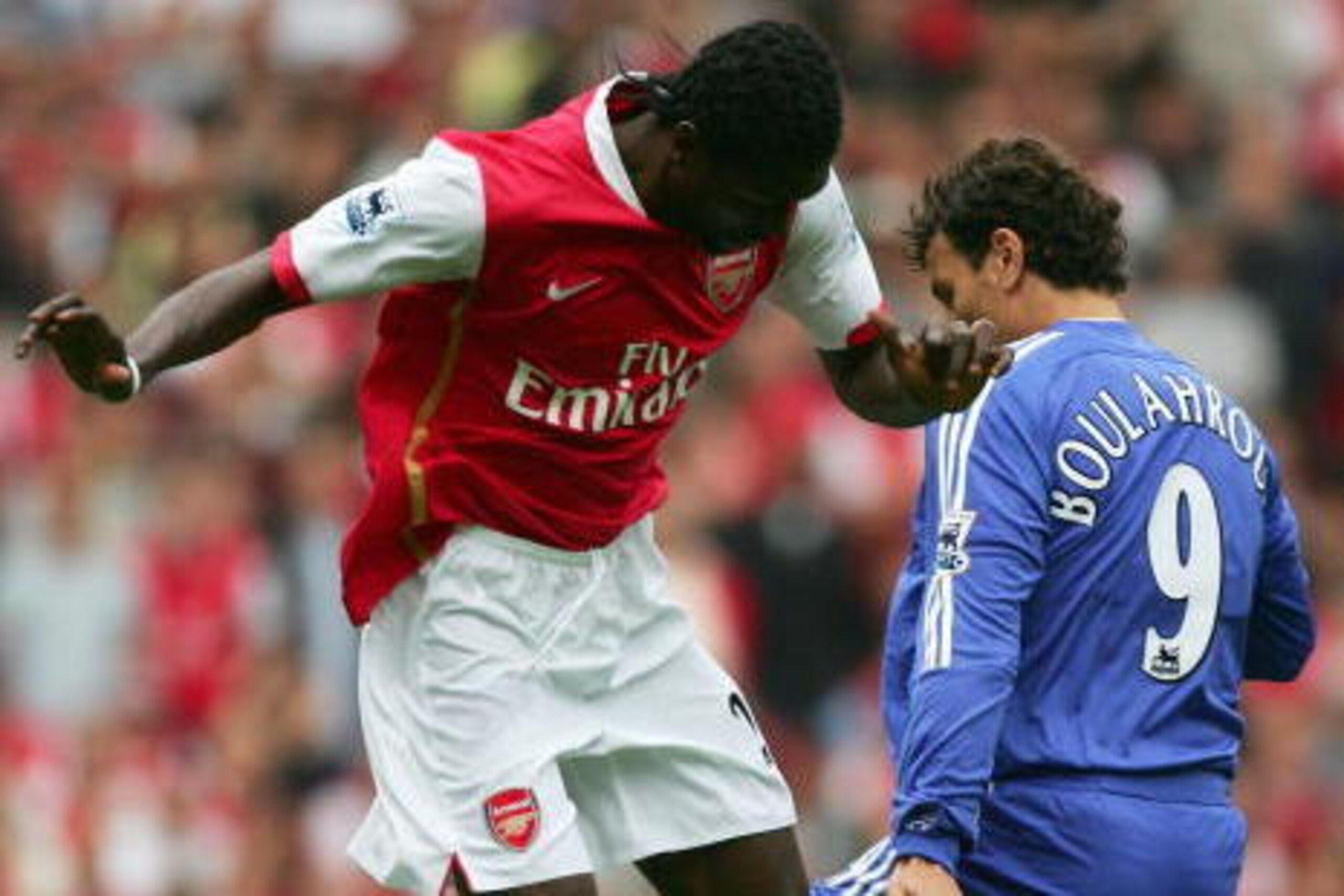 LONDON - MAY 06:  Emmanuel Adebayor of Arsenal (L) takes on Khalid Boulahrouz of Chelsea during the Barclays Premiership match between Arsenal and Chelsea at the Emirates Stadium on May 6, 2007 in London, England.  (Photo by Mike Hewitt/Getty Images)