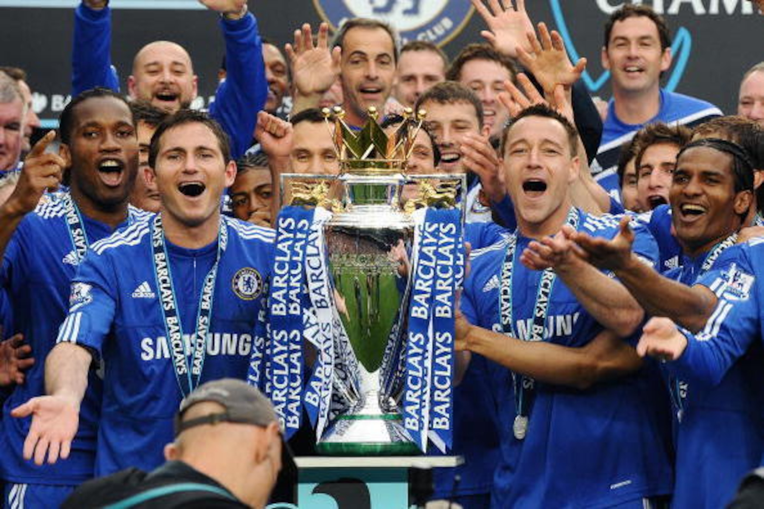 Chelsea players celebrate with the Barclays Premier League trophy after Chelsea win the title with a 8-0 victory over Wigan Athletic in the English Premier League football match at Stamford Bridge, West London, England, on May 9, 2010. Chelsea finished th