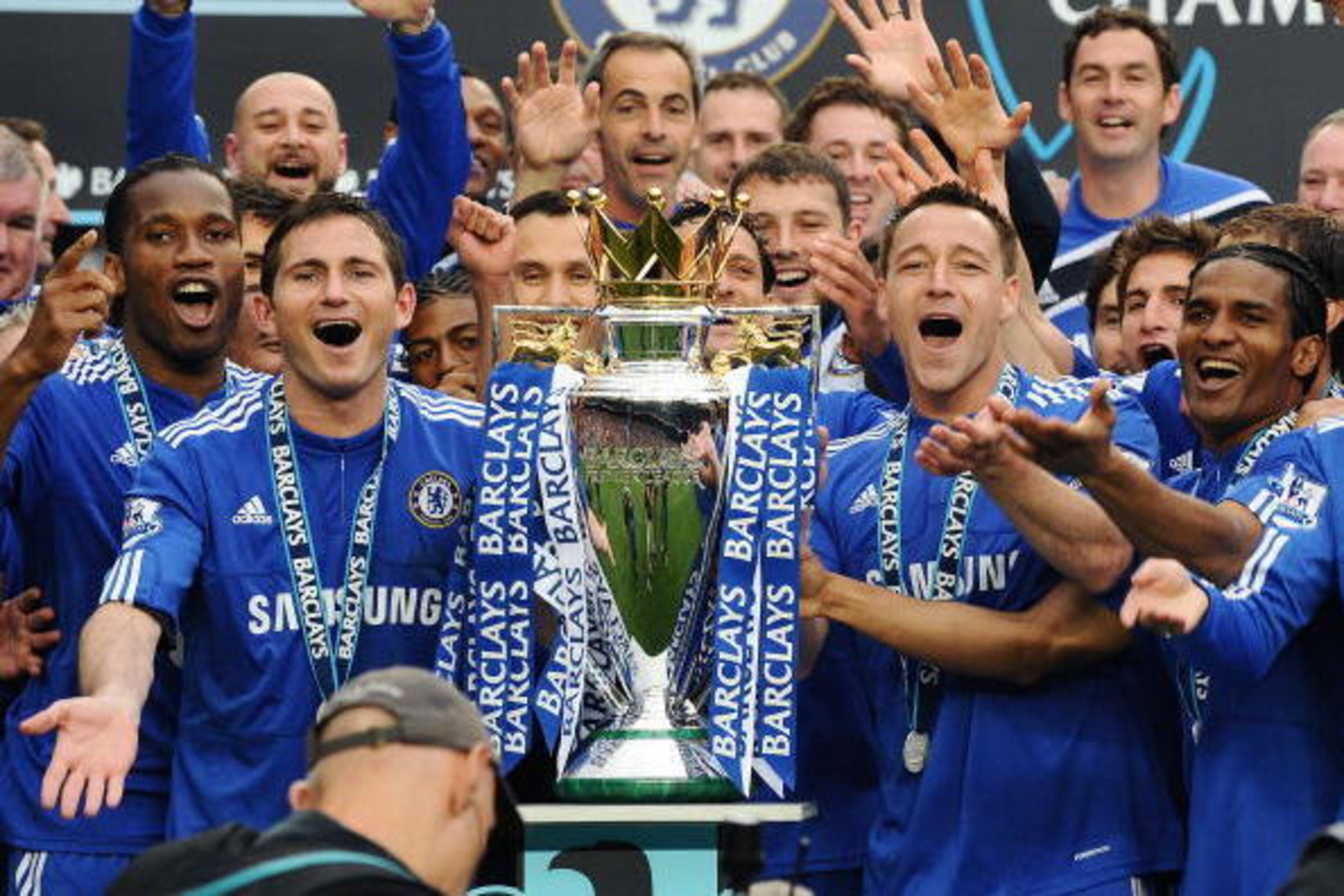Chelsea players celebrate with the Barclays Premier League trophy after Chelsea win the title with a 8-0 victory over Wigan Athletic in the English Premier League football match at Stamford Bridge, West London, England, on May 9, 2010. Chelsea finished th