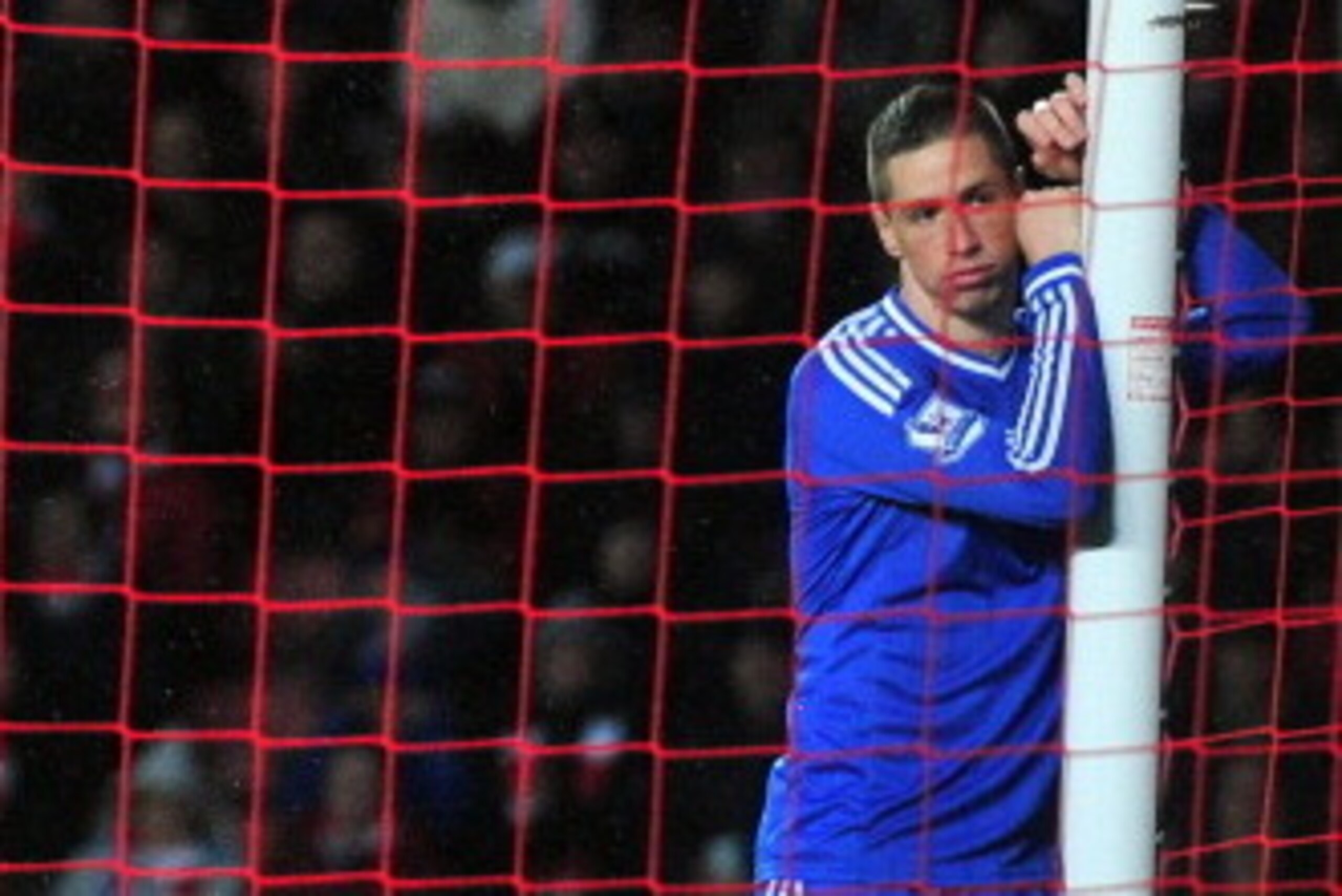 Chelsea's Spanish striker Fernando Torres reacts after missing a chance on goal during the English Premier League football match between Southampton and Chelsea at St Mary's Stadium in Southampton, southern England, on January 1, 2014. Chelsea won 3-0. AF