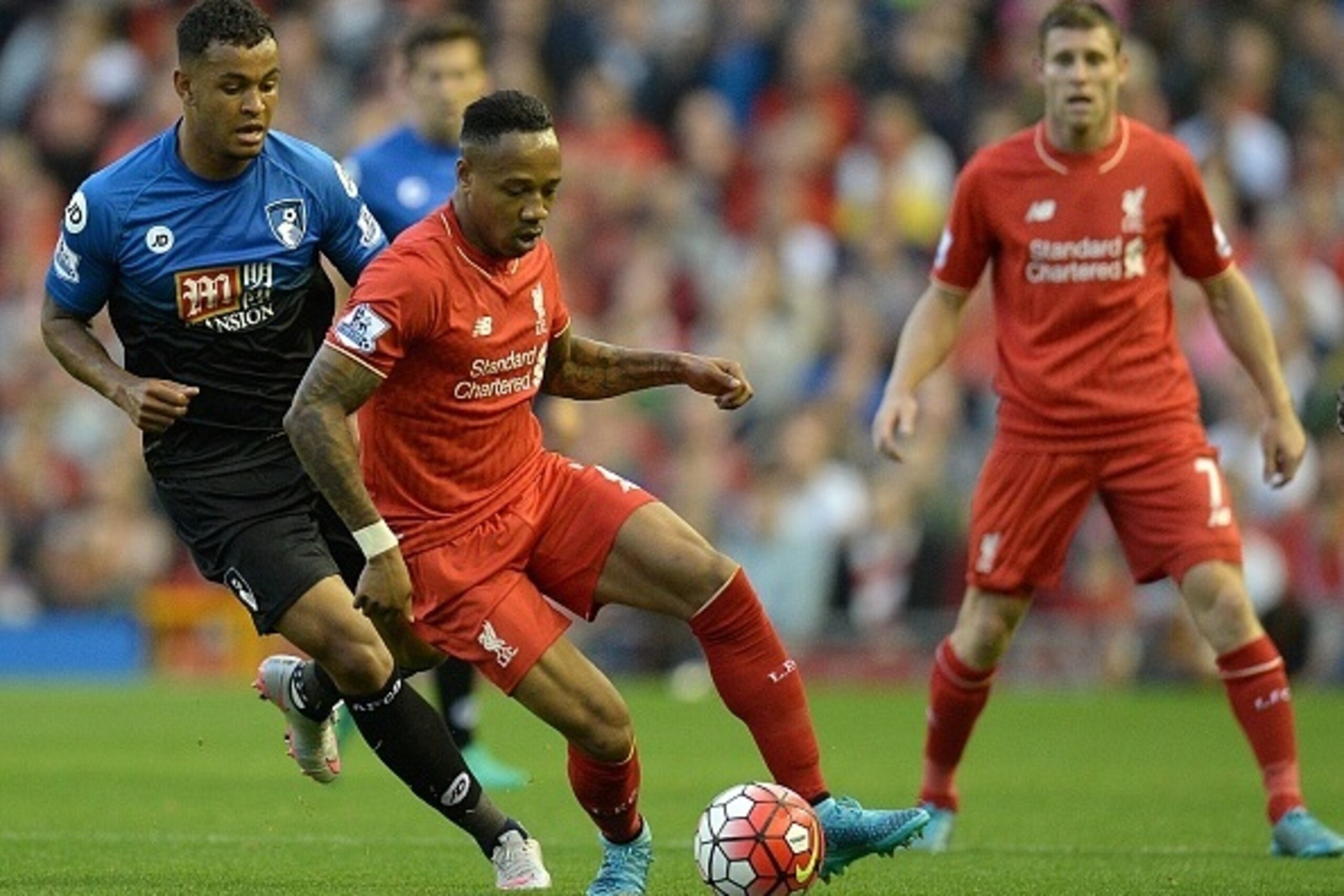 Liverpool's English defender Nathaniel Clyne (Front 2nd L) in action against Bournemouth's Norwegian striker Joshua King during the English Premier League football match between Liverpool and Bournemouth at the Anfield stadium in Liverpool, north-west Eng Liverpool's English defender Nathaniel Clyne (Front 2nd L) in action against Bournemouth's Norwegian striker Joshua King during the English Premier League football match between Liverpool and Bournemouth at the Anfield stadium in Liverpool, north-west Eng