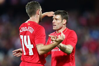 ADELAIDE, AUSTRALIA - JULY 20:  James Milner (R) of Liverpool celebrates with Jordan Henderson (L) after scoring the first goal during the international friendly match between Adelaide United and Liverpool FC at Adelaide Oval on July 20, 2015 in Adelaide,