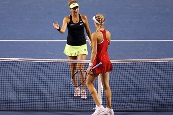 TORONTO, ON - AUGUST 11:  Belinda Bencic of Switzerland shakes hands with Eugenie Bouchard of Canada after their match during Day 2 of the Rogers Cup at the Aviva Centre on August 11, 2015 in Toronto, Ontario, Canada.  (Photo by Vaughn Ridley/Getty Images