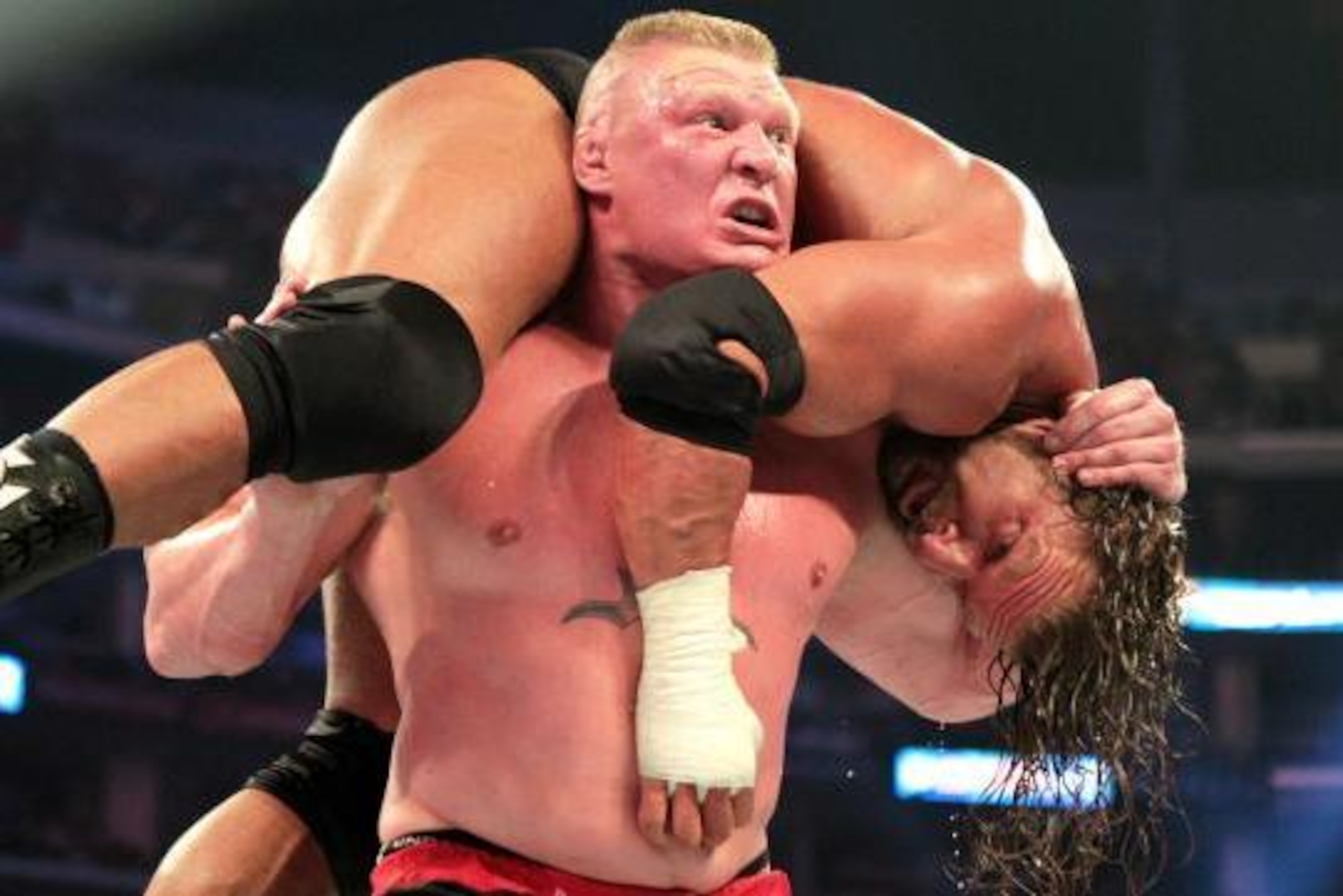Brock Lesnar ready to hit the F-5 on Triple H.