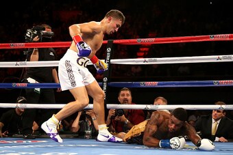 INGLEWOOD, CA - MAY 16:  Willie Monroe Jr. goes to down for the first of two second round knockdowns by Gennady Golovkin  in their World Middleweight Championship fight at The Forum on May 16, 2015 in Inglewood, California  (Photo by Stephen Dunn/Getty Im