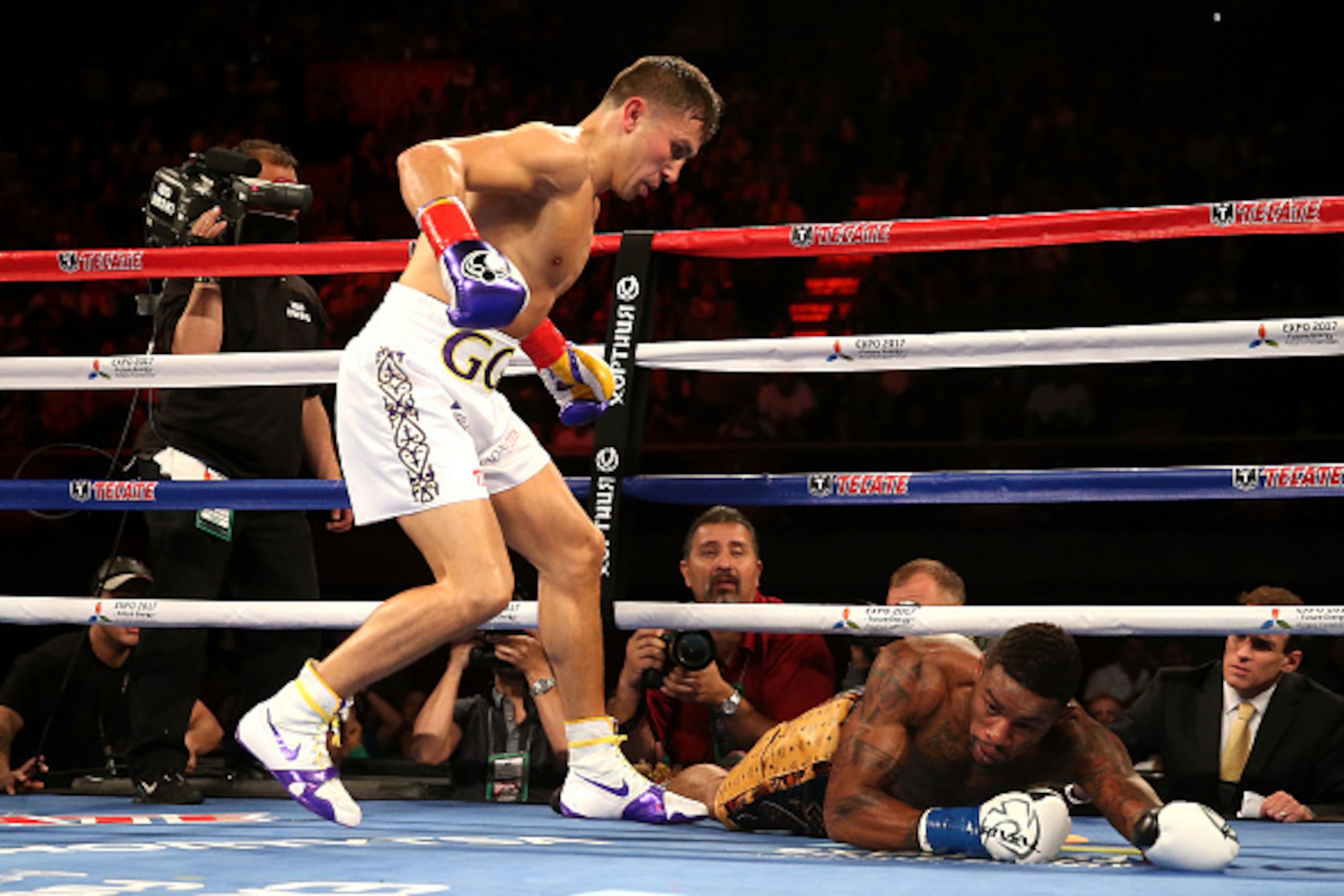 INGLEWOOD, CA - MAY 16:  Willie Monroe Jr. goes to down for the first of two second round knockdowns by Gennady Golovkin  in their World Middleweight Championship fight at The Forum on May 16, 2015 in Inglewood, California  (Photo by Stephen Dunn/Getty Im