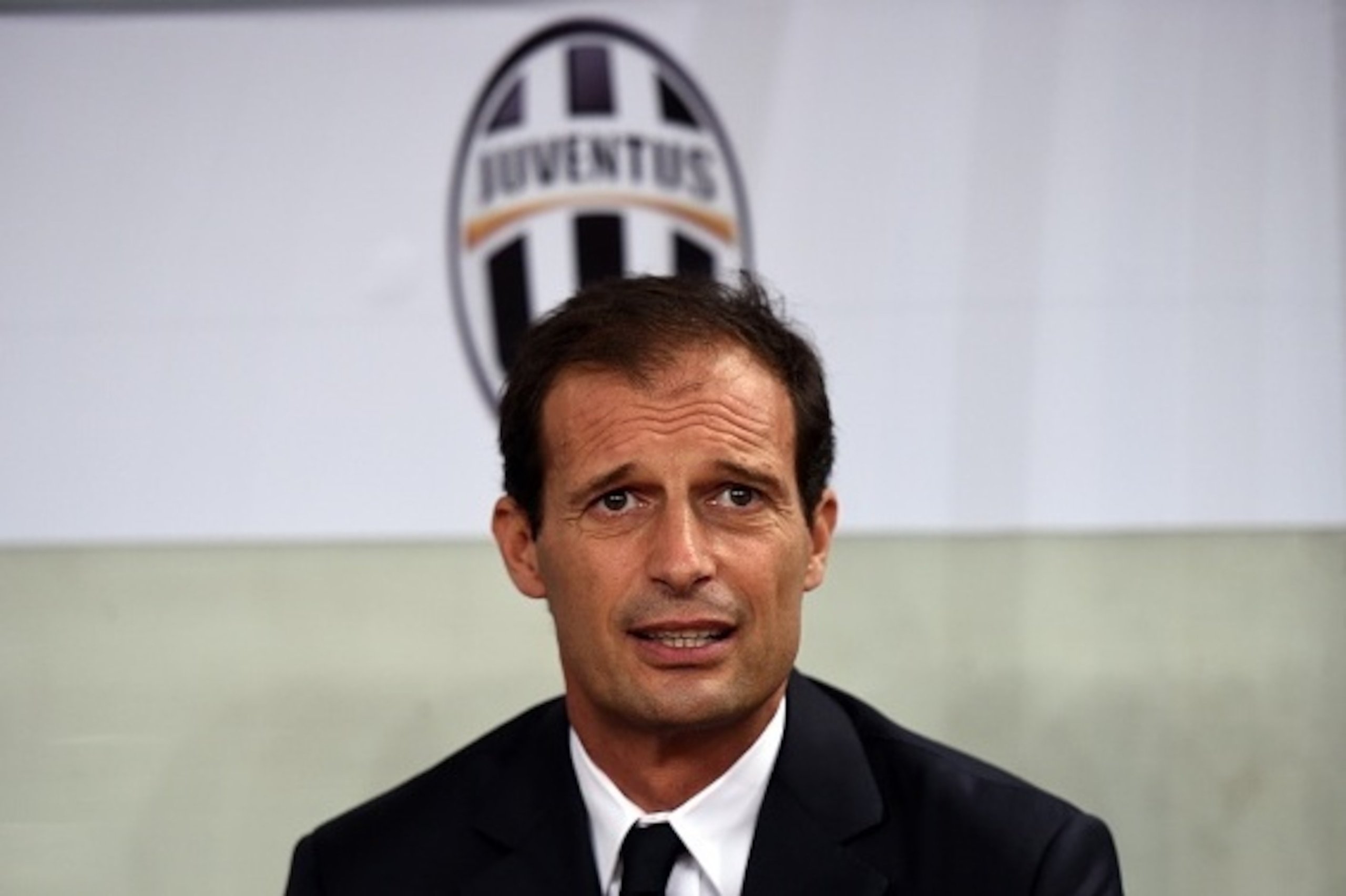 Juventus head coach Massimiliano Allegri awaits the Italian Super Cup final football match between Juventus and Lazio in Shanghai on August 8, 2015. AFP PHOTO / JOHANNES EISELE        (Photo credit should read JOHANNES EISELE/AFP/Getty Images)