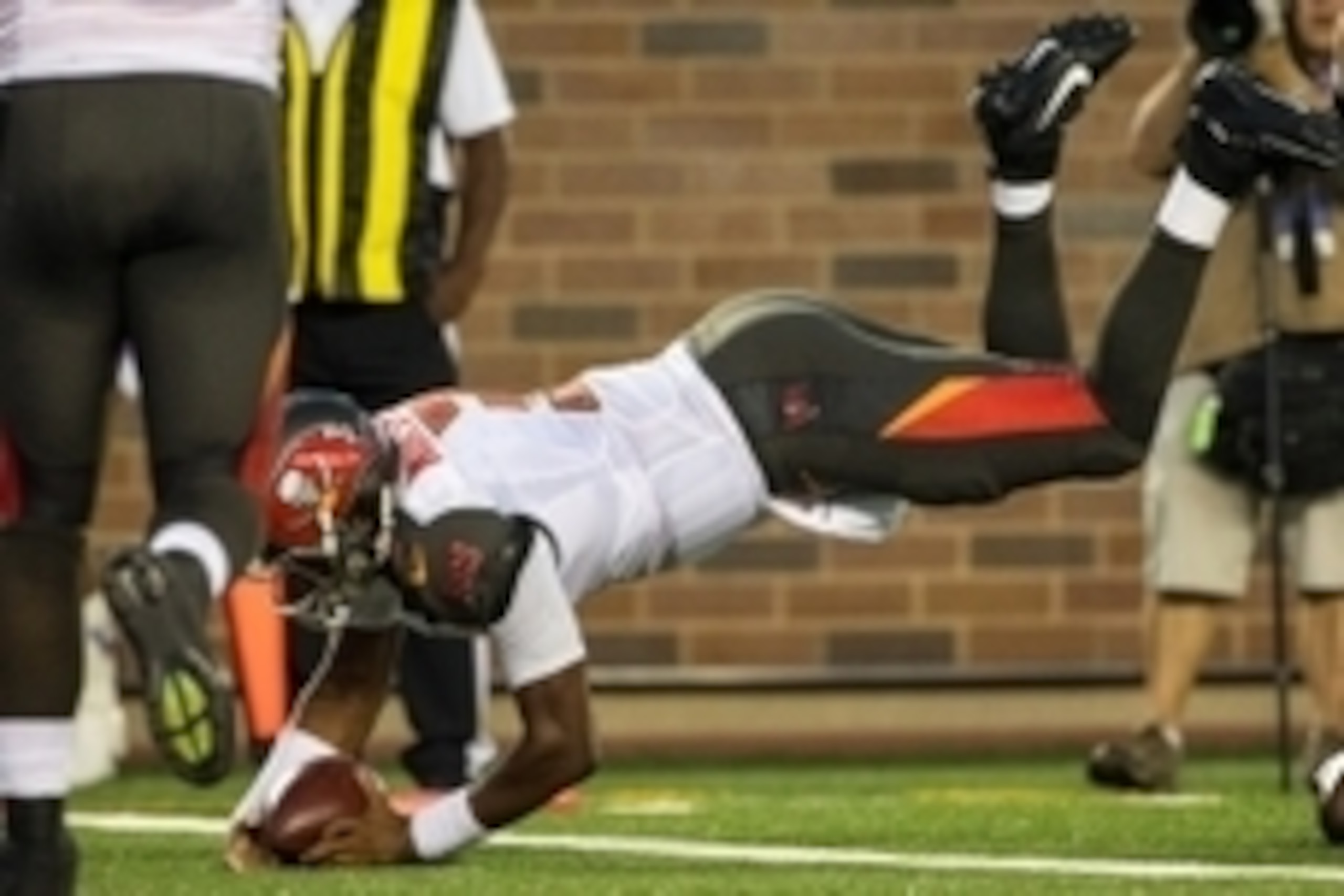 Aug 15, 2015; Minneapolis, MN, USA; Tampa Bay Buccaneers quarterback Jameis Winston (3) dives for a touchdown during the second quarter in a preseason NFL football game against the Minnesota Vikings at TCF Bank Stadium. Mandatory Credit: Brace Hemmelgarn-