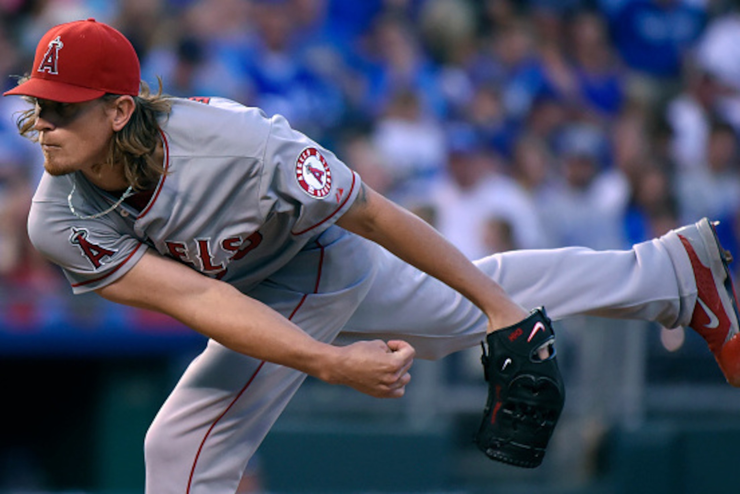 KANSAS CITY, MO - AUGUST 14:  Jered Weaver #36 of the Los Angeles Angels of Anaheim throws in the third inning against the Kansas City Royals at Kauffman Stadium on August 14, 2015 in Kansas City, Missouri. (Photo by Ed Zurga/Getty Images)